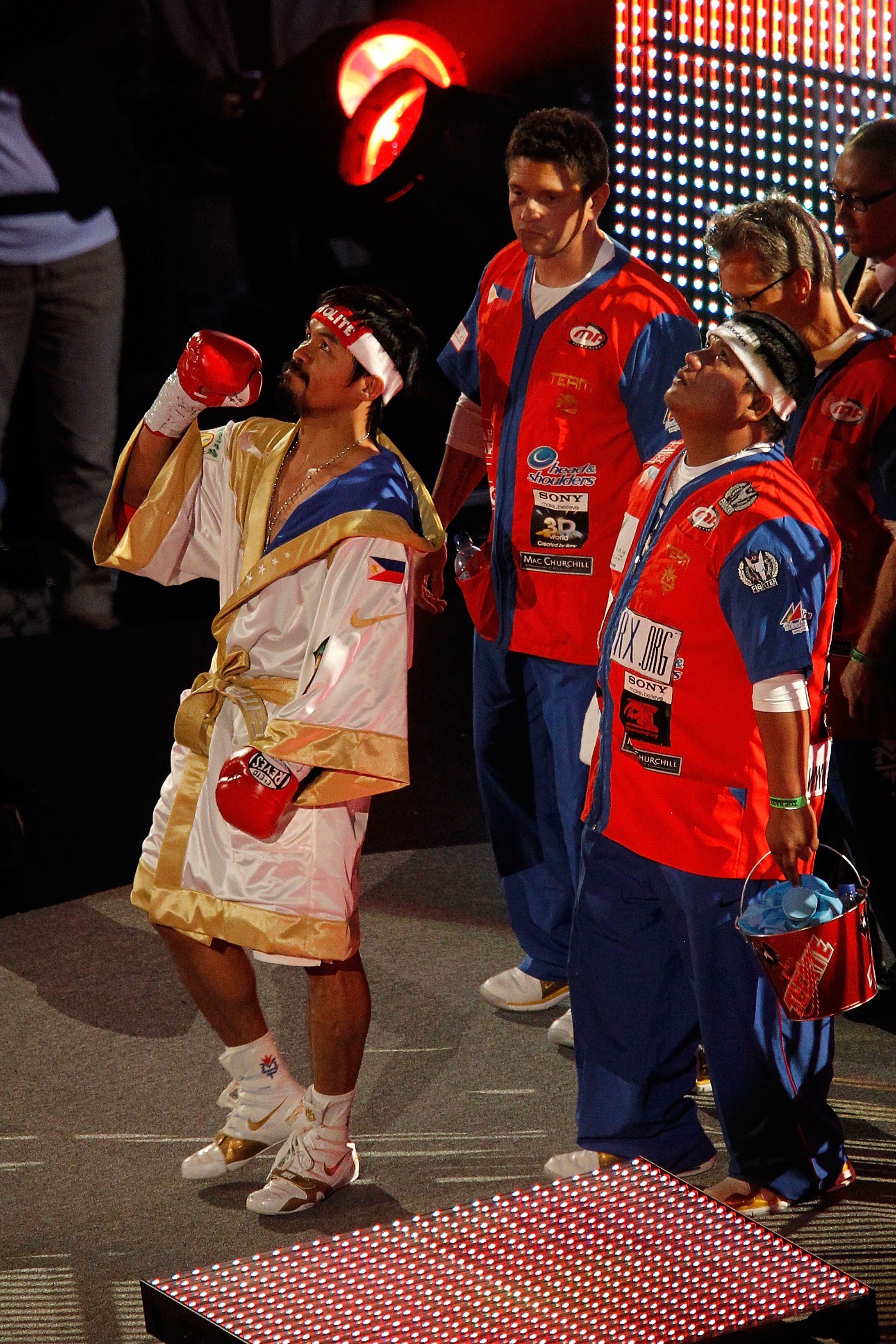 ARLINGTON, TX - NOVEMBER 13:  Manny Pacquiao of the Philippines makes his way to the ring for his fight against Antonio Margarito (black trunks) of Mexico during their WBC World Super Welterweight Title bout at Cowboys Stadium on November 13, 2010 in Arli