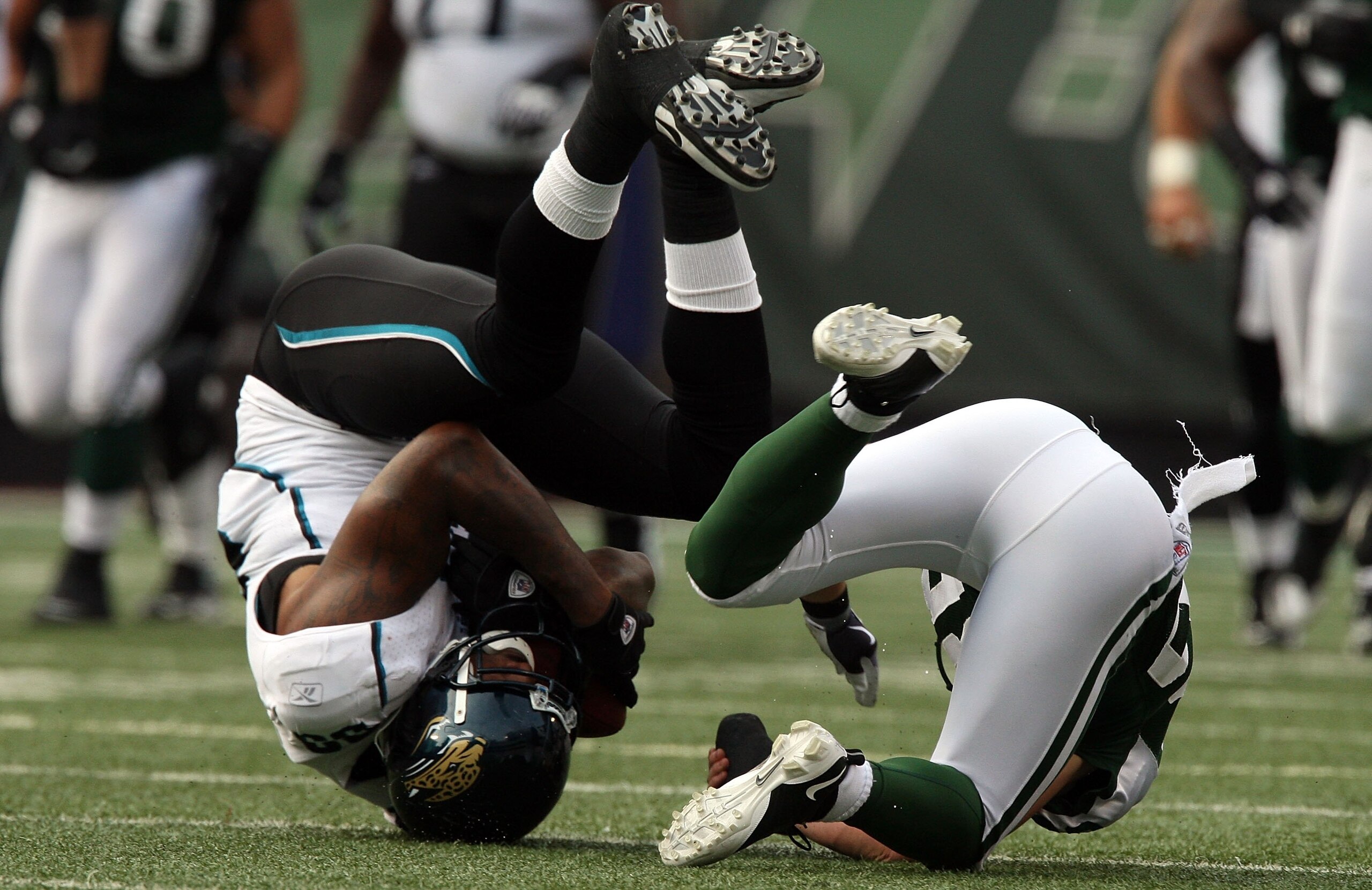 EAST RUTHERFORD, NJ - NOVEMBER 15:  Marcedes Lewis #89 of the Jacksonville Jaguars tumbles after a reception against the New York Jets on November 15, 2009 at Giants Stadium in East Rutherford, New Jersey.  (Photo by Jim McIsaac/Getty Images)