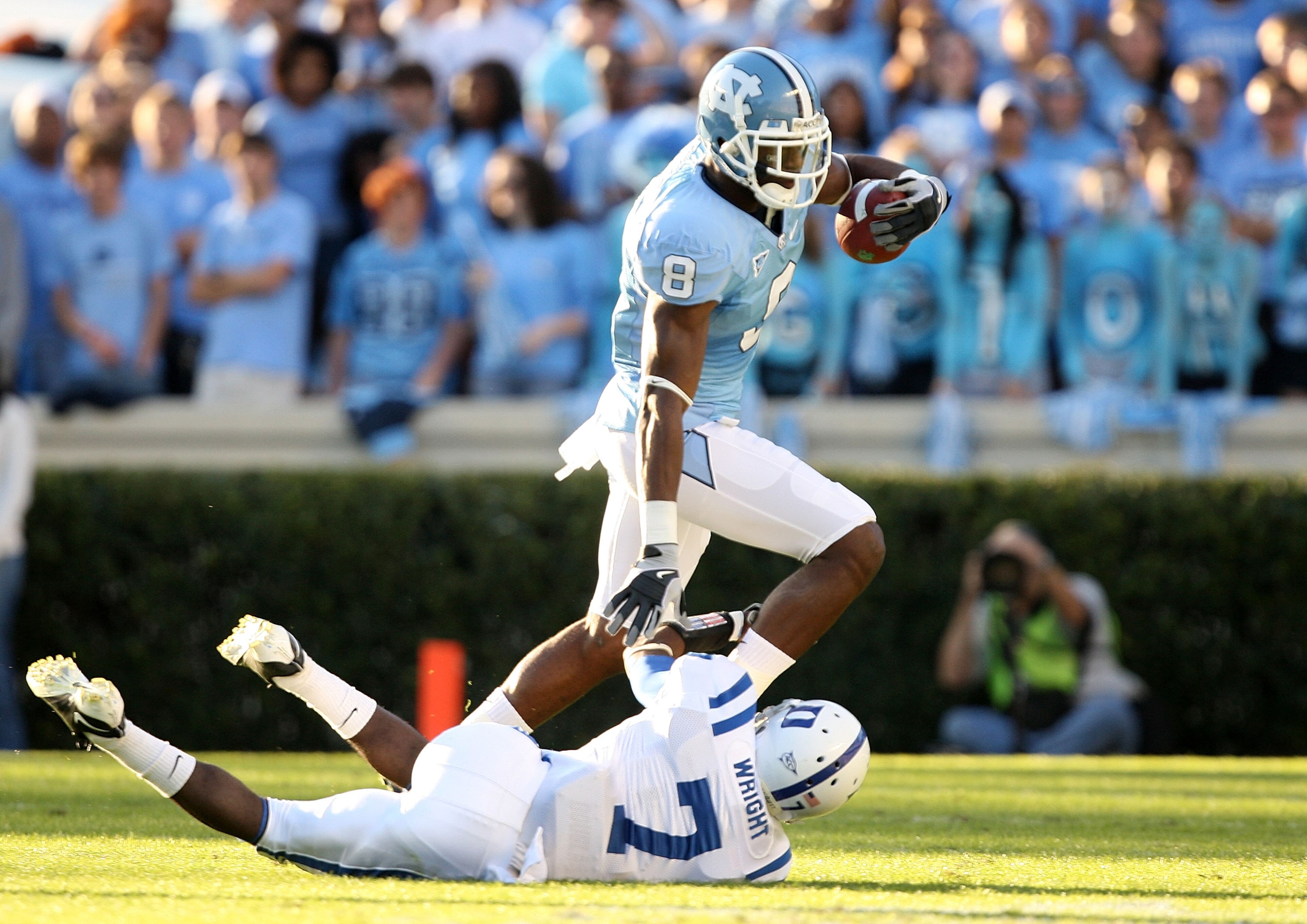 CHAPEL HILL, NC - NOVEMBER 07:  Leon Wright #7 of the Duke Blue Devils tries to tackle Greg Little #8 of the North Carolina Tar Heels during their game at Kenan Stadium on November 7, 2009 in Chapel Hill, North Carolina.  (Photo by Streeter Lecka/Getty Im