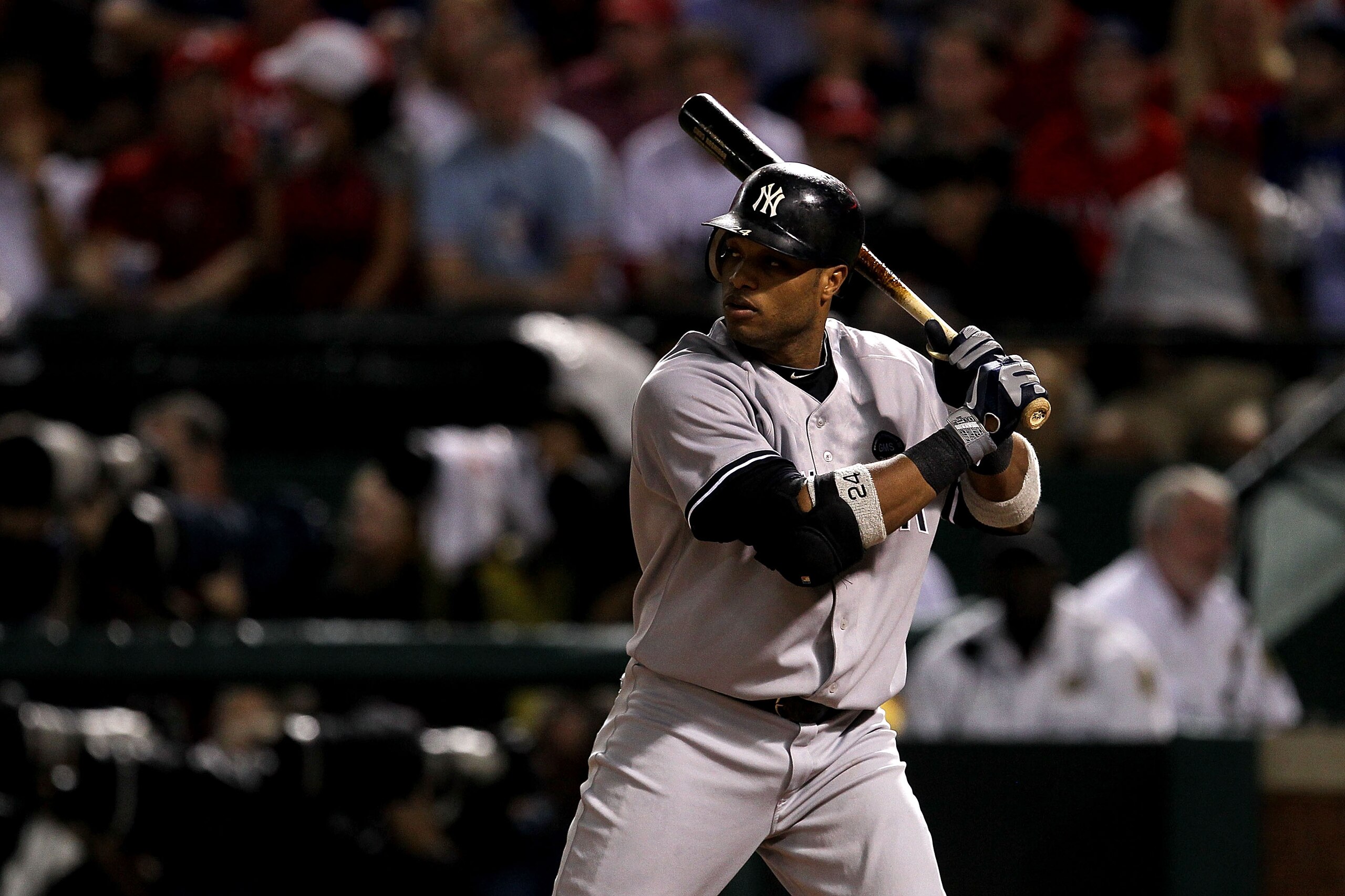 ARLINGTON, TX - OCTOBER 22:  Robinson Cano #24 of the New York Yankees bats against the Texas Rangers in Game Six of the ALCS during the 2010 MLB Playoffs at Rangers Ballpark in Arlington on October 22, 2010 in Arlington, Texas. The Rangers won 6-1.  (Pho