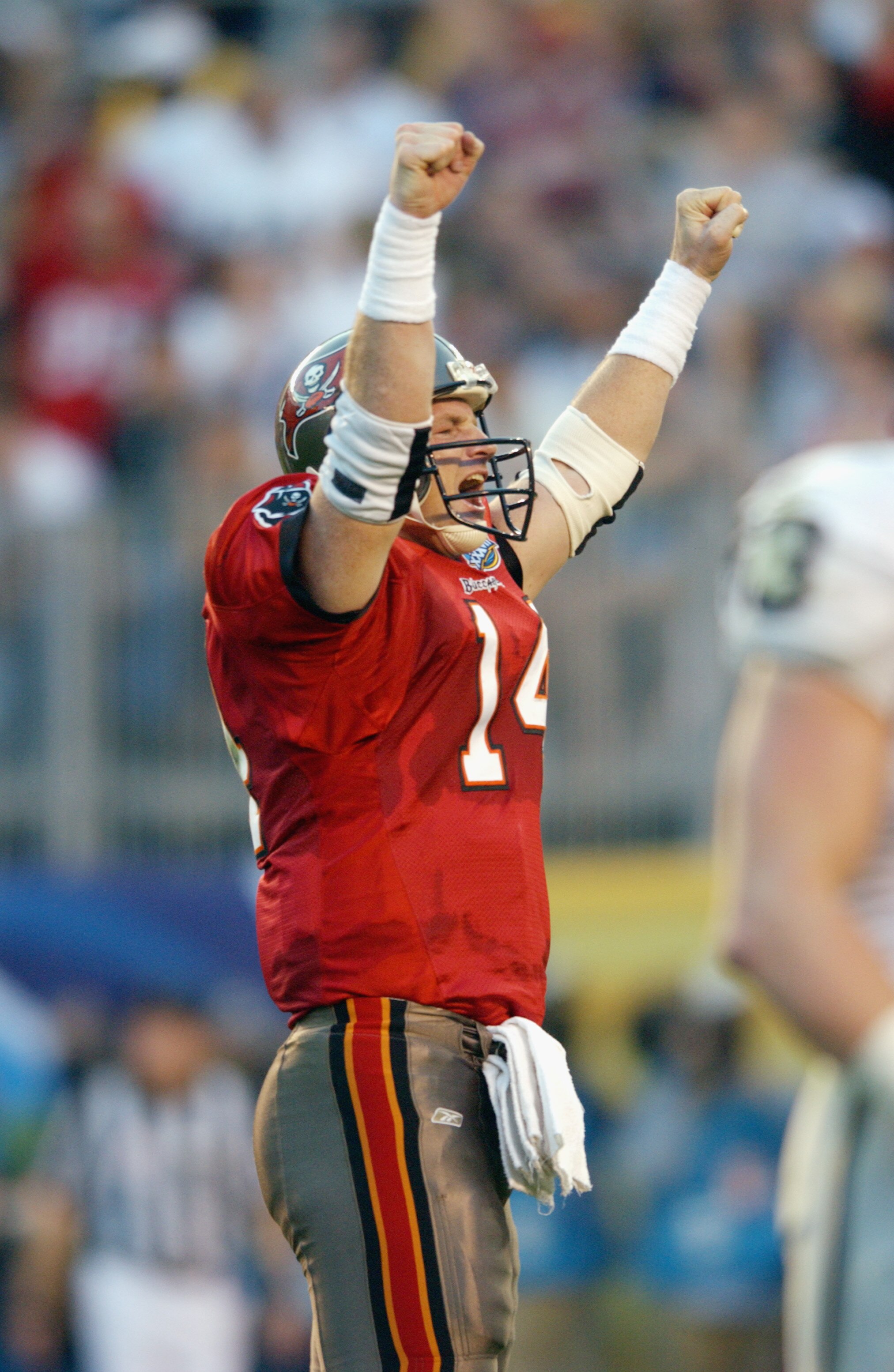 SAN DIEGO - JANUARY 26:  Quarterback Brad Johnson #14 of the Tampa Bay Buccaneers celebrates a touchdown against the Oakland Raiders in Super Bowl XXXVII on January 26, 2003 at Qualcomm Stadium in San Diego, California. The Buccaneers defeated the Raiders