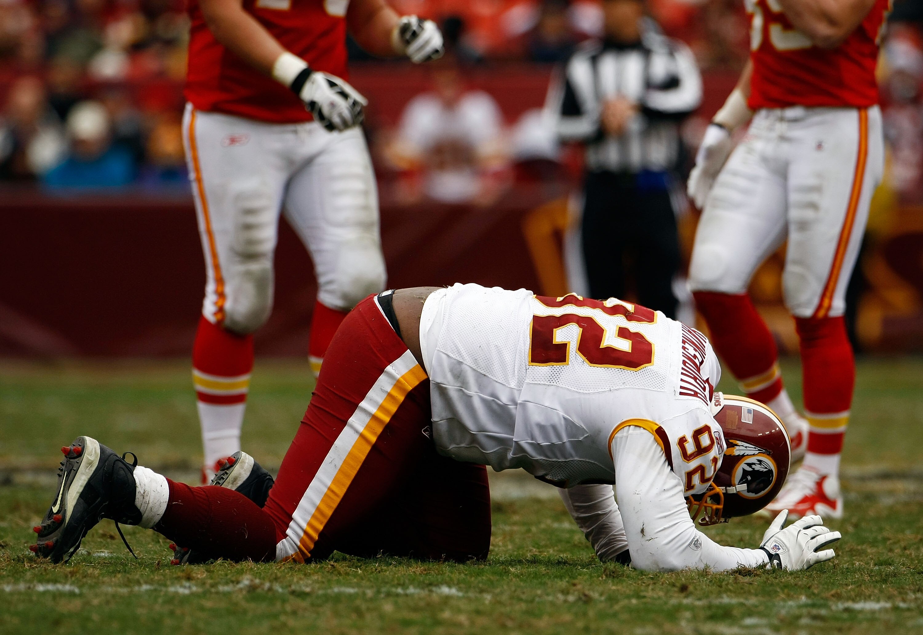 LANDOVER, MD - OCTOBER 18:  Albert Haynesworth #92 the Washington Redskins struggles to get off the field against the Kansas City Chiefs during their game October 18, 2009 at FedEx Field in Landover, Maryland. The Chiefs won the game 14-6.  (Photo by Win