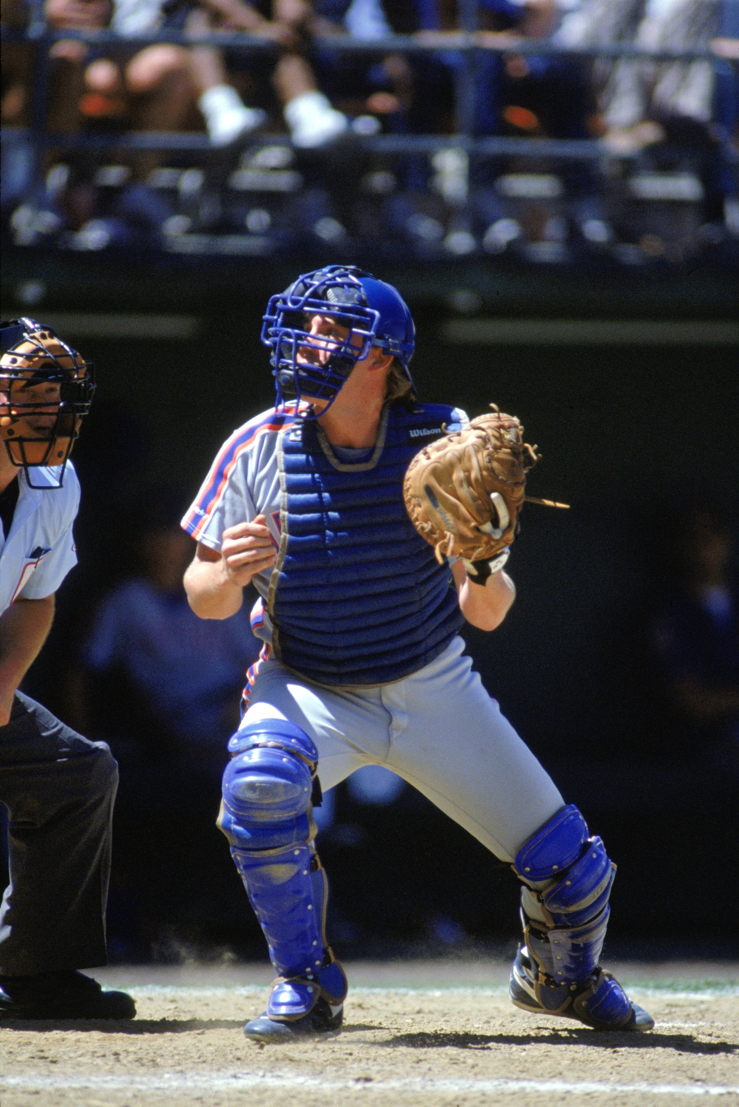 1990:  Catcher Mackey Sasser of the New York Mets watches the pop fly during a game in the 1990 season. (Photo by: Stephen Dunn/Getty Images)
