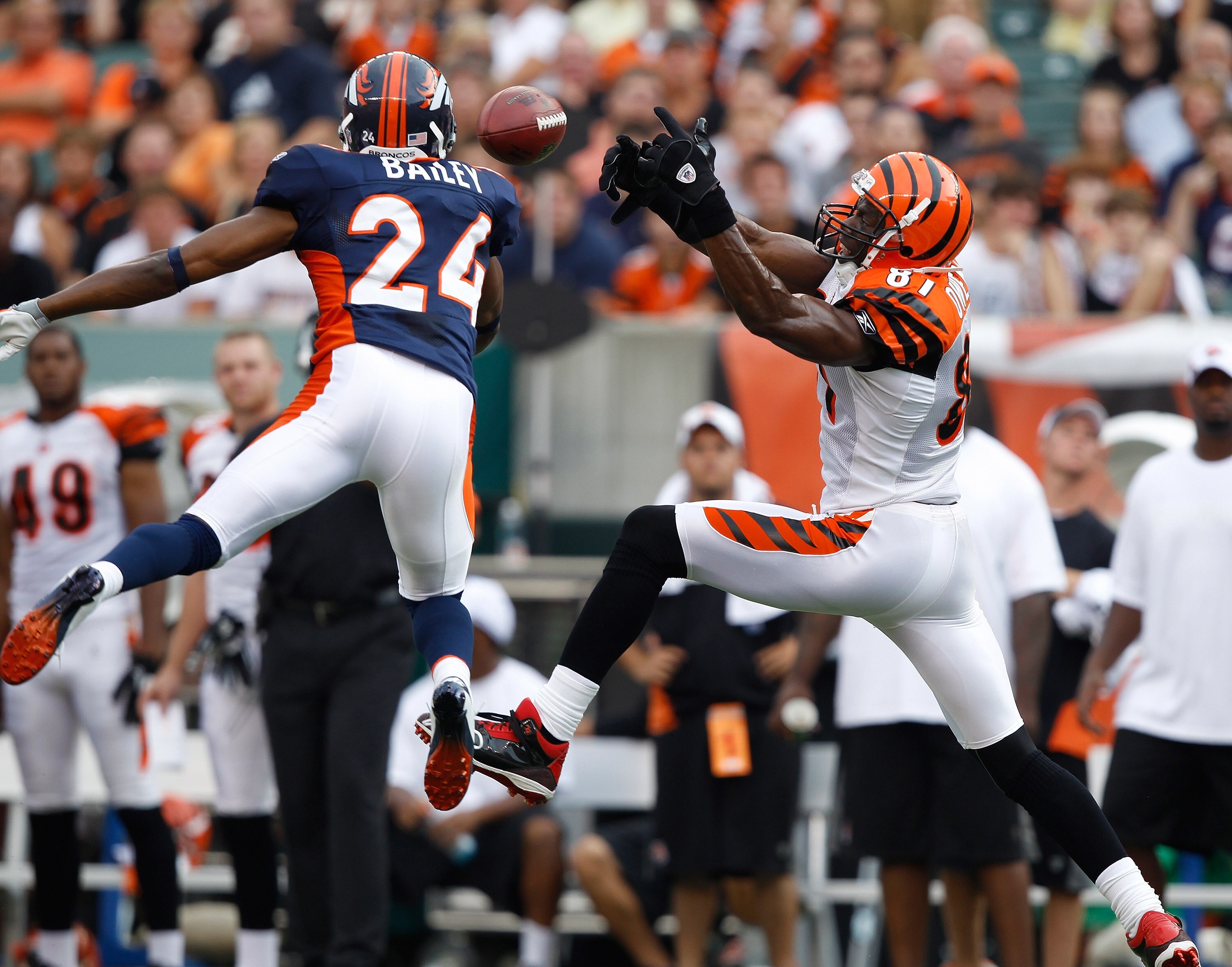 CINCINNATI, OH - AUGUST 15: Champ Bailey #24 of the Denver Broncos knocks away a pass intended for Terrell Owens #81 of the Cincinnati Bengals at Paul Brown Stadium on August 15, 2010 in Cincinnati, Ohio. The Bengals won 33-24. (Photo by Joe Robbins/Getty