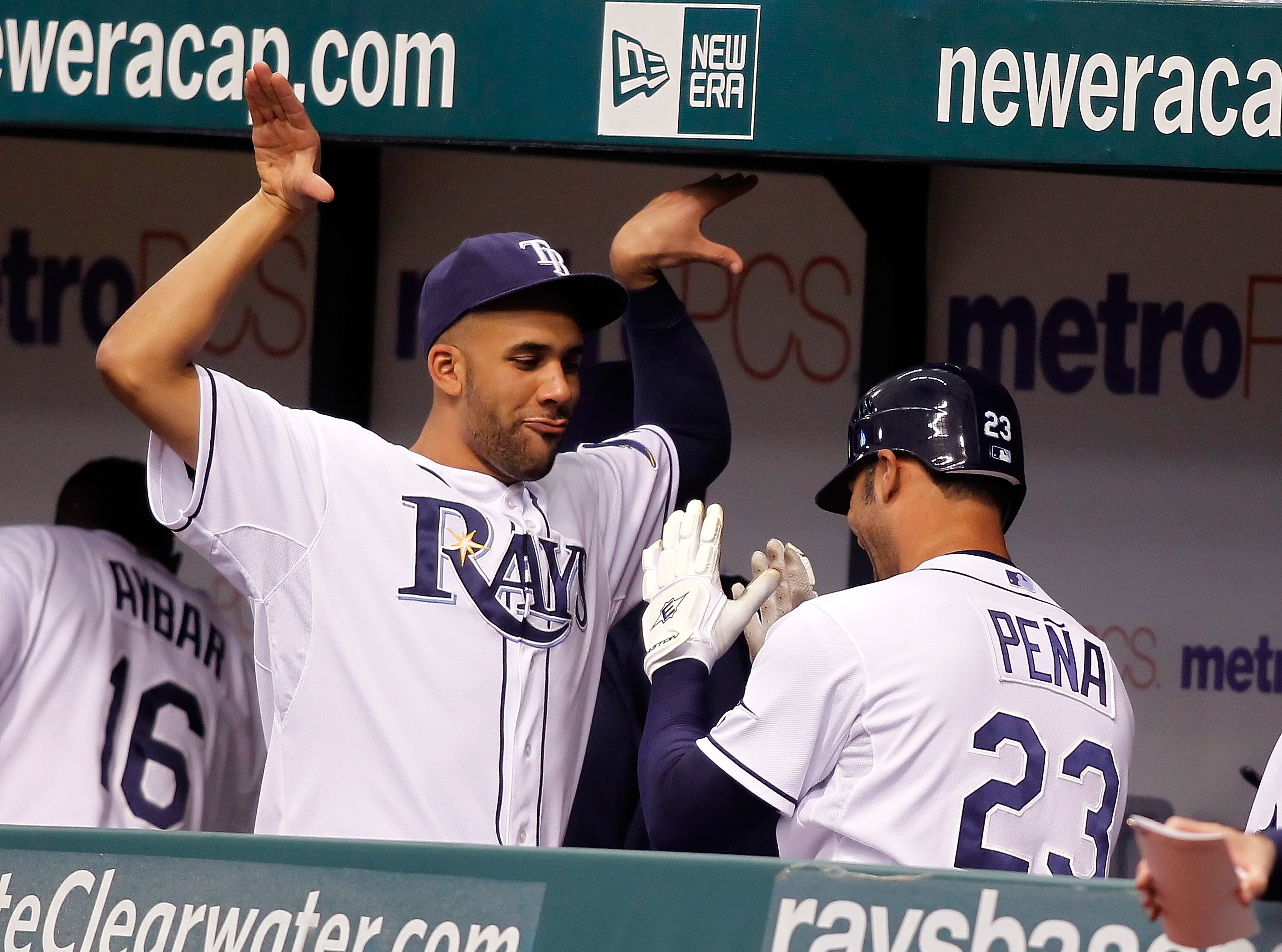 ST. PETERSBURG - JUNE 12:  Pitcher David Price #14 (left) of the Tampa Bay Rays celebrates the home run of Carlos Pena #23 against the Florida Marlins during the game at Tropicana Field on June 12, 2010 in St. Petersburg, Florida.  (Photo by J. Meric/Gett