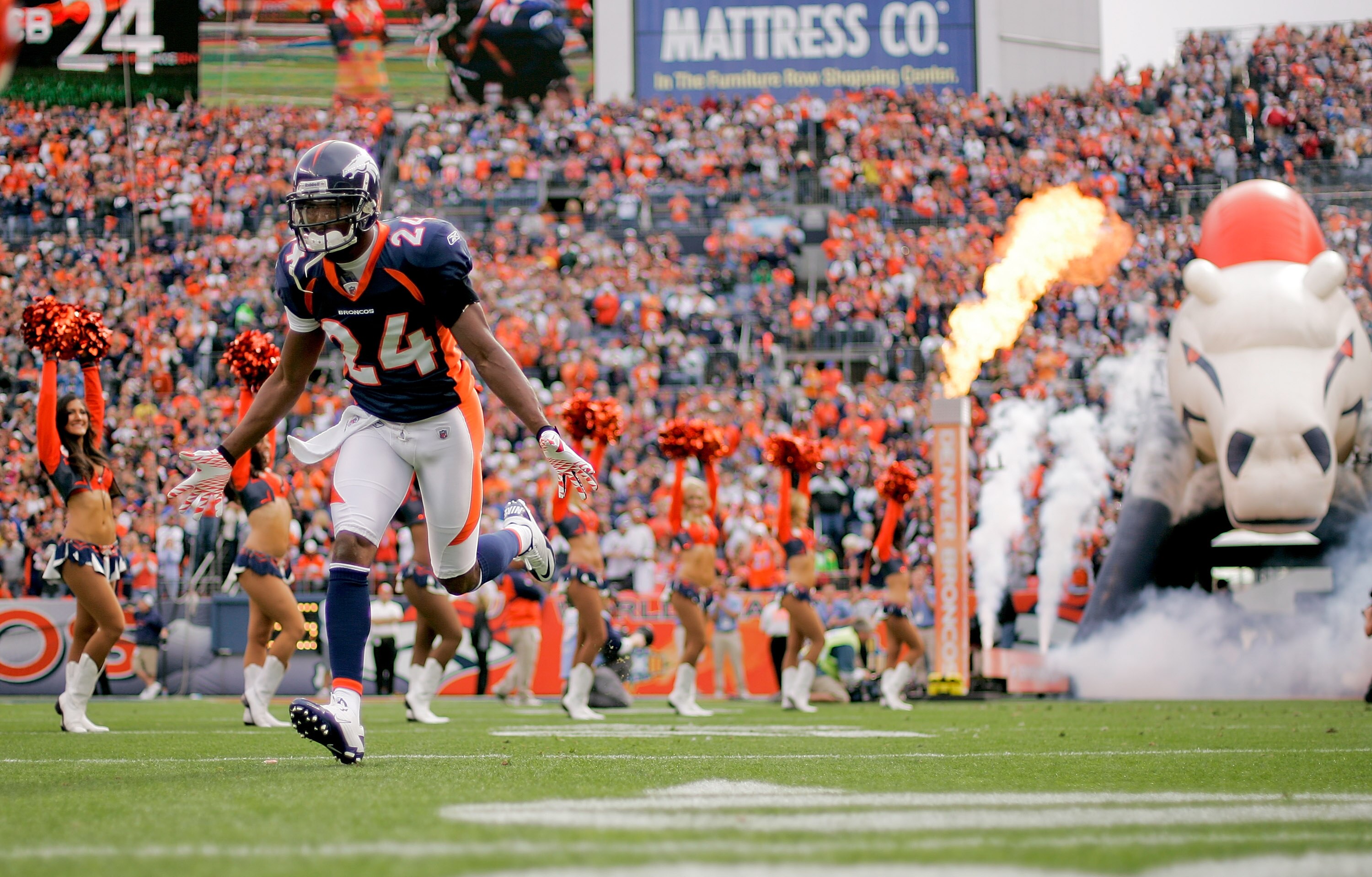 DENVER - OCTOBER 24:  Cornerback Champ Bailey #24 of the Denver Broncos runs onto the field before taking on the Oakland Raiders at INVESCO Field at Mile High on October 24, 2010 in Denver, Colorado. (Photo by Justin Edmonds/Getty Images)