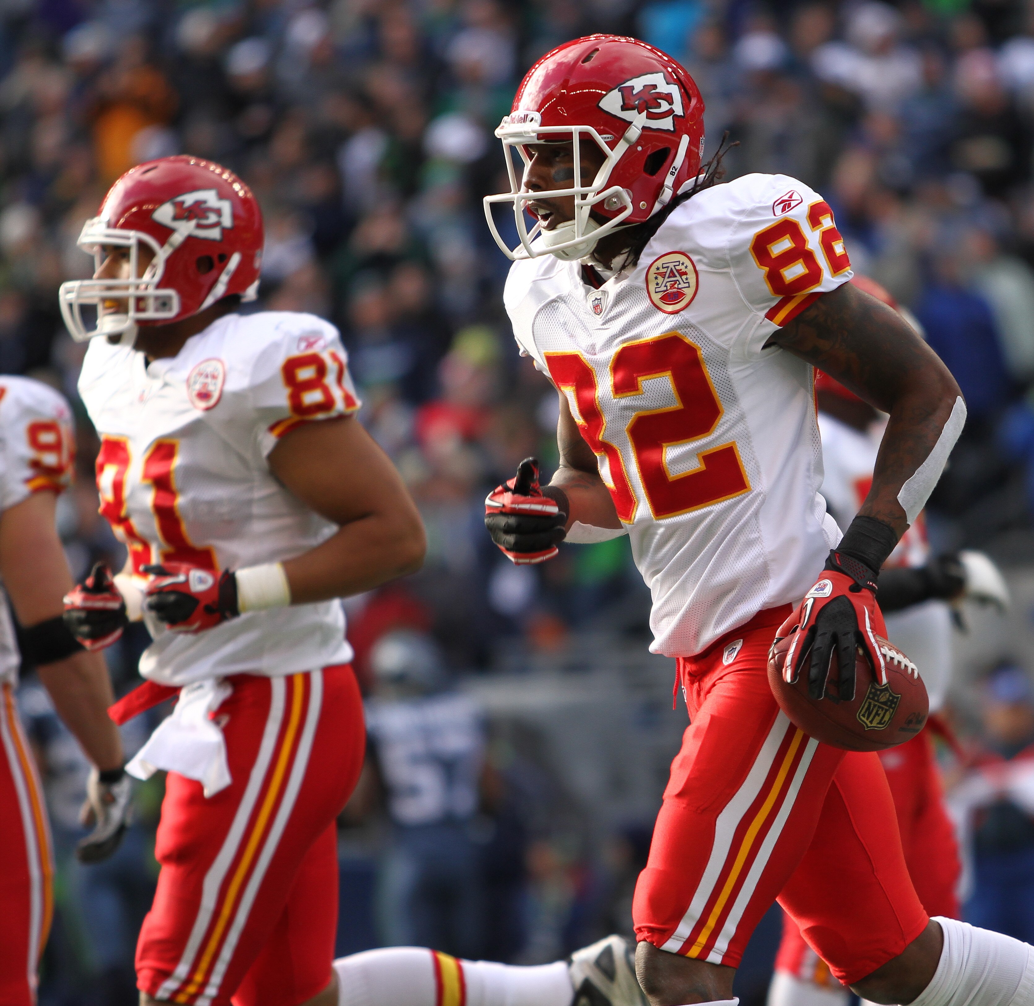 SEATTLE, WA - NOVEMBER 28:  Wide receiver Dwayne Bowe #82 of the Kansas City Chiefs heads back to the team bench after scoring his first touchdown against Kelly Jennings #21 of the Seattle Seahawks at Qwest Field on November 28, 2010 in Seattle, Washingto
