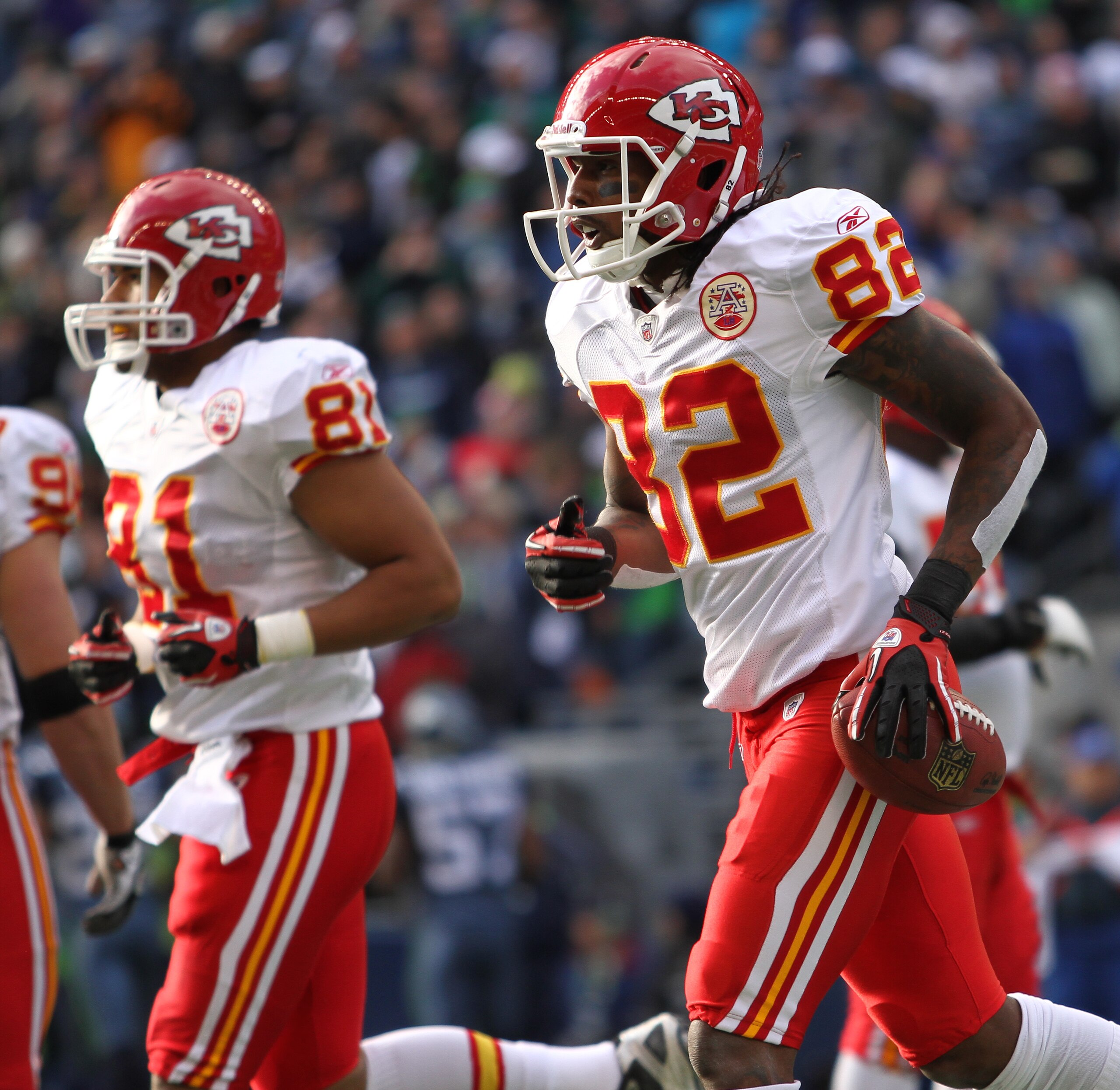 SEATTLE, WA - NOVEMBER 28:  Wide receiver Dwayne Bowe #82 of the Kansas City Chiefs heads back to the team bench after scoring his first touchdown against Kelly Jennings #21 of the Seattle Seahawks at Qwest Field on November 28, 2010 in Seattle, Washingto