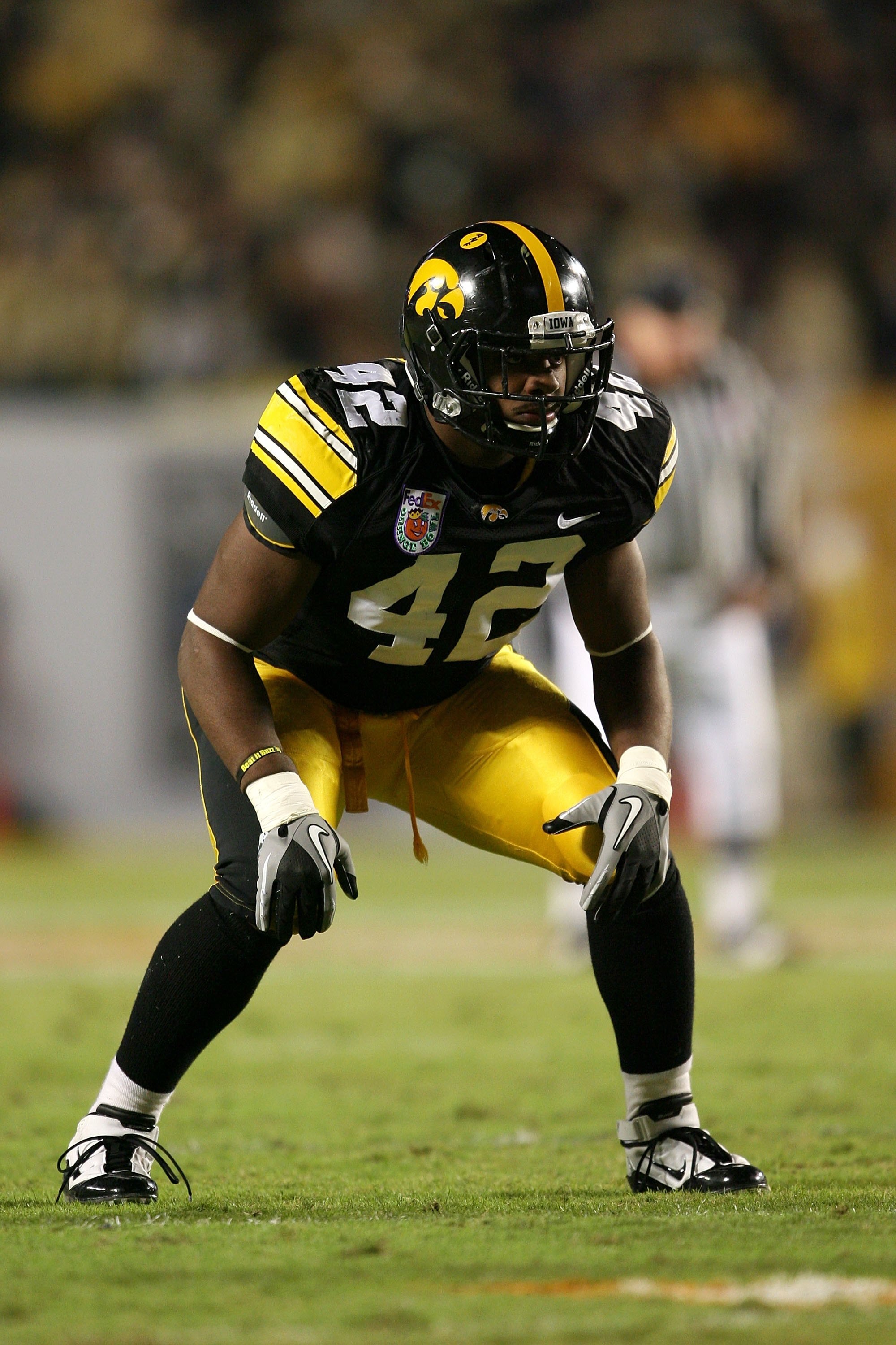 MIAMI GARDENS, FL - JANUARY 05:  Linebacker Jeremiha Hunter #42 of the Iowa Hawkeyes lines up on defense against the Georgia Tech Yellow Jackets during the FedEx Orange Bowl at Land Shark Stadium on January 5, 2010 in Miami Gardens, Florida. Iowa won 24-1