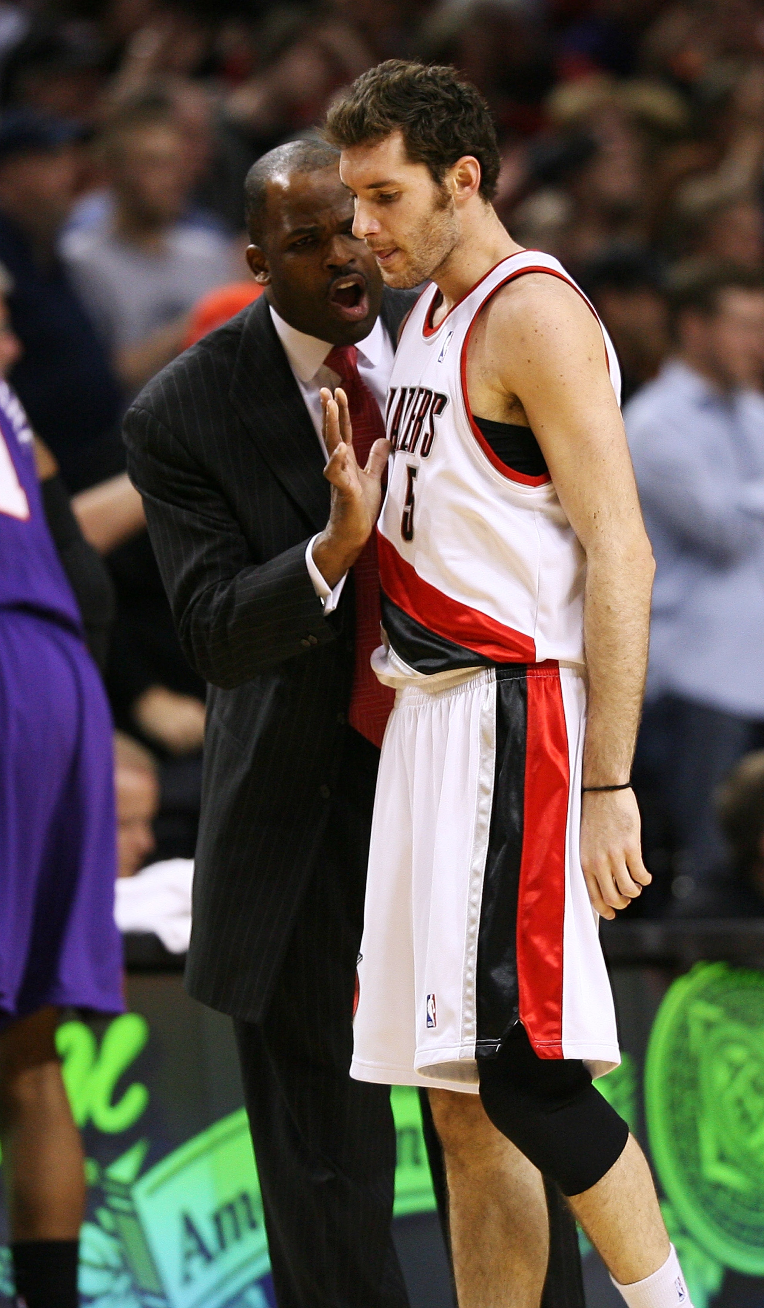 PORTLAND, OR - APRIL 29:  Head coach Nate McMillan of the Portland Trail Blazers talks with Rudy Fernandez #5 against the Phoenix Suns during Game Six of the Western Conference Quarterfinals of the NBA Playoffs on April 29, 2010 at the Rose Garden in Port