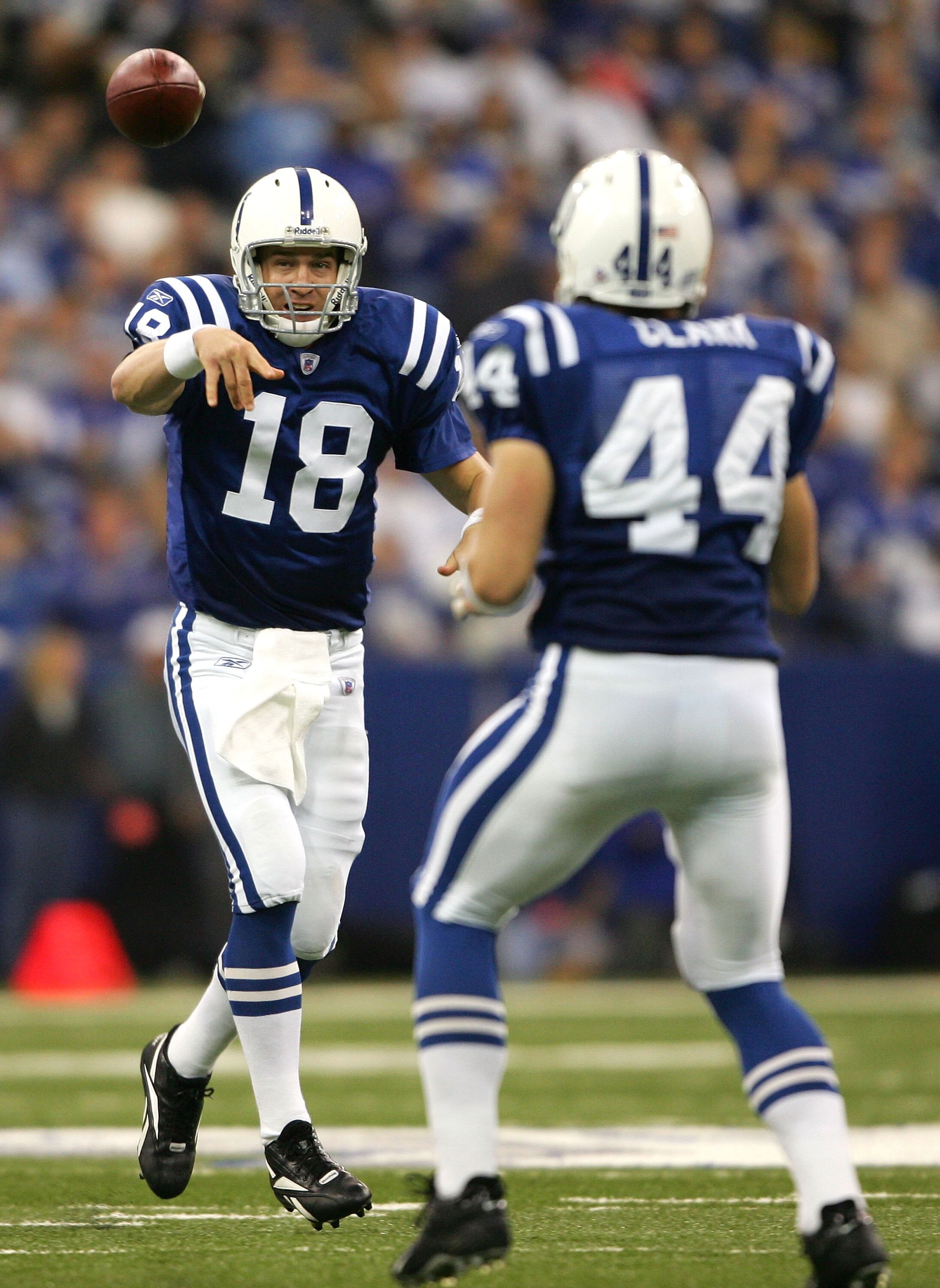 INDIANAPOLIS - NOVEMBER 13:  Peyton Manning #18 of the Indianapolis Colts passes the ball to Dallas Clark #44 in the second half against the Houston Texans on November 13, 2005 at the RCA Dome in Indianapolis, Indiana. The Colts defeated the Texans 31-17.