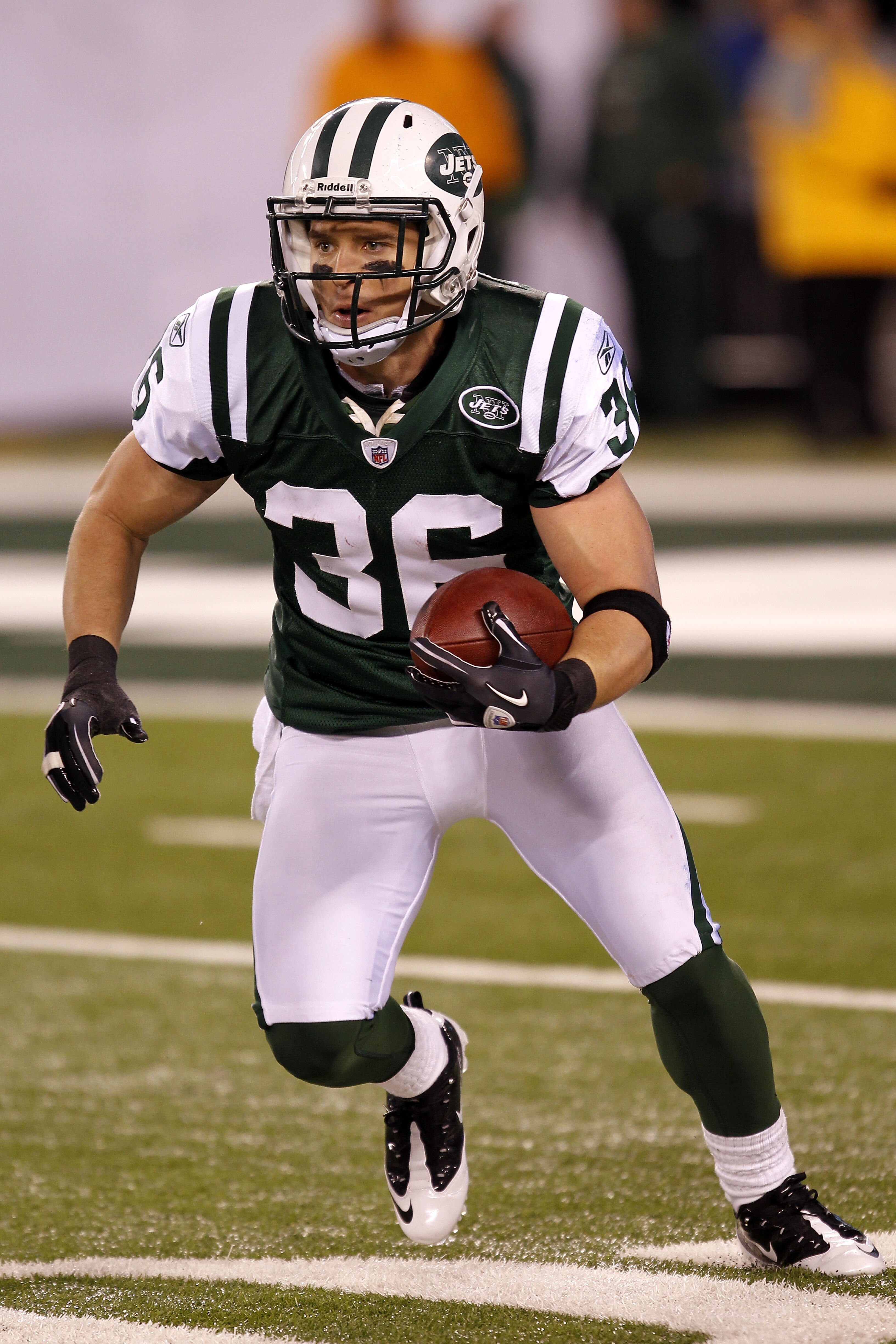 EAST RUTHERFORD, NJ - NOVEMBER 25:  Jim Leonhard #36 of the New York Jets runs with the ball against the Cincinnati Bengals at New Meadowlands Stadium on November 25, 2010 in East Rutherford, New Jersey. The Jets defeated the Bengal 26-10.  (Photo by Chri