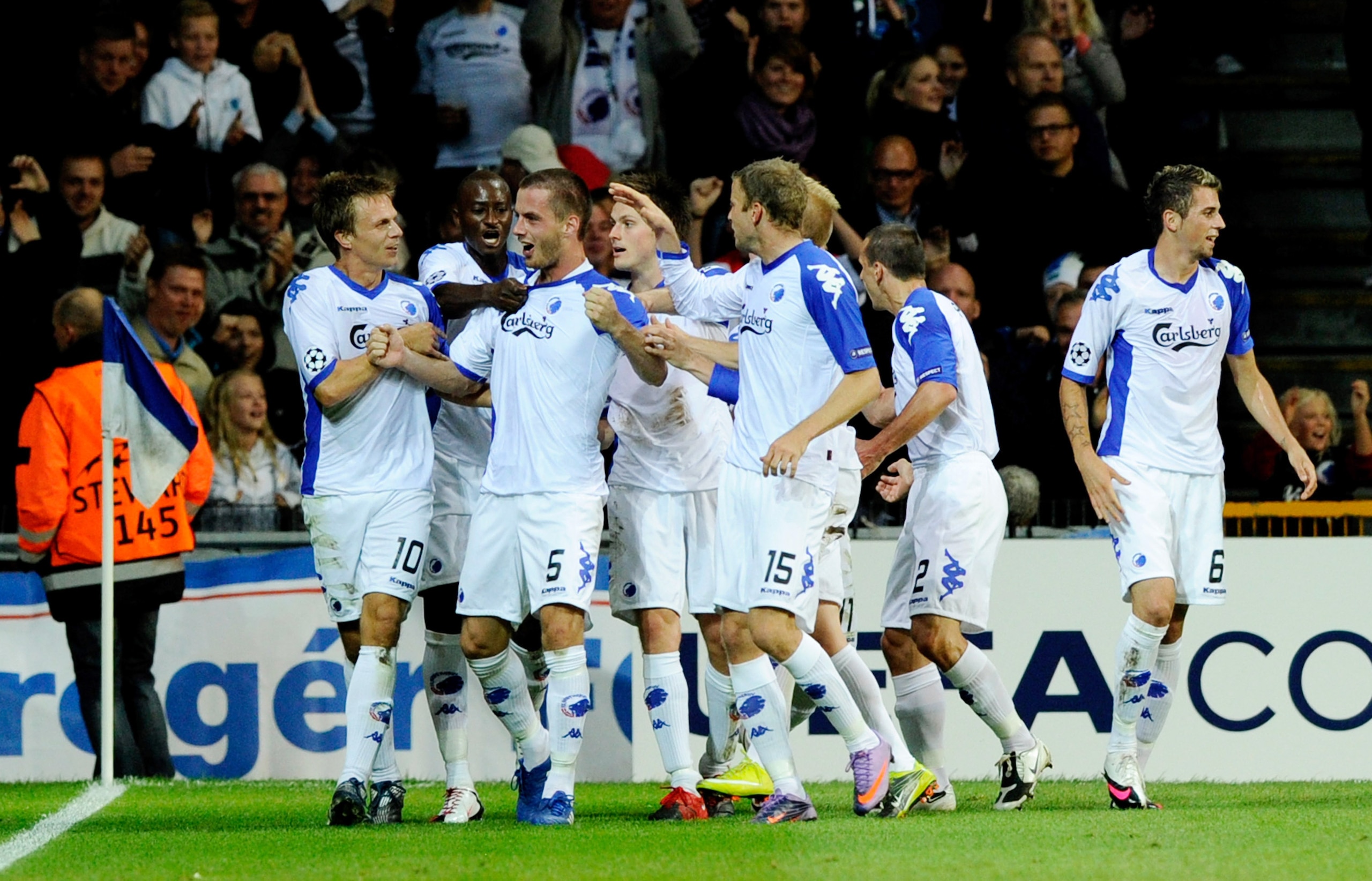 COPENHAGEN, DENMARK - AUGUST 25:  Celebrates of Solvi Ottesen (C) of FC Copenhagen after scores the first goal during the Champions League Play-off match between FC Copenaghen and Rosenborg on August 25, 2010 in Copenhagen, Denmark.  (Photo by Claudio Vil