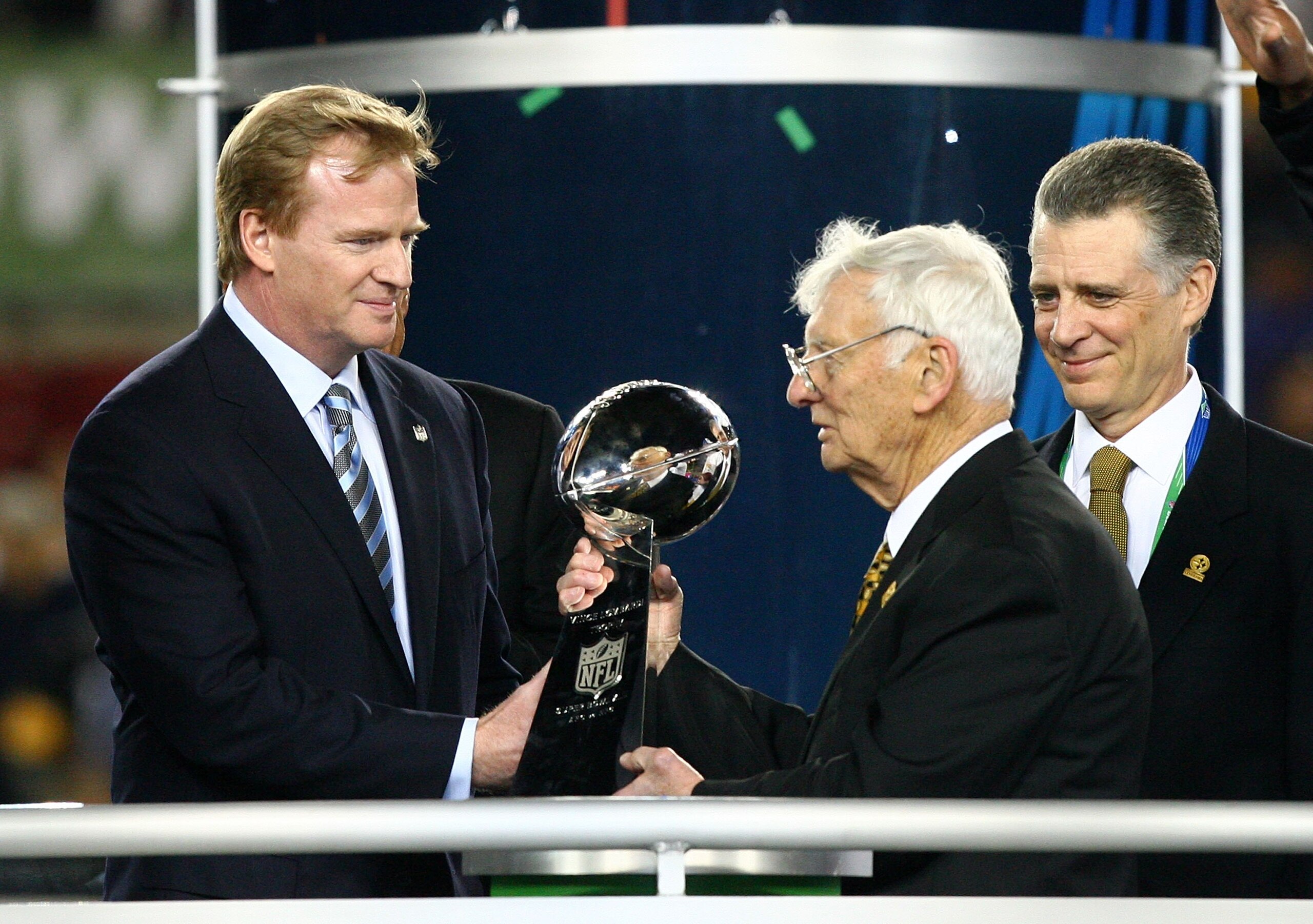 TAMPA, FL - FEBRUARY 01:  NFL Commissioner Roger Goodell (L) present Dan Rooney, team owner of the Pittsburgh Steelers, with the Vince Lombardi trophy after the Steelers won 27-23 against the Arizona Cardinals during Super Bowl XLIII on February 1, 2009 a
