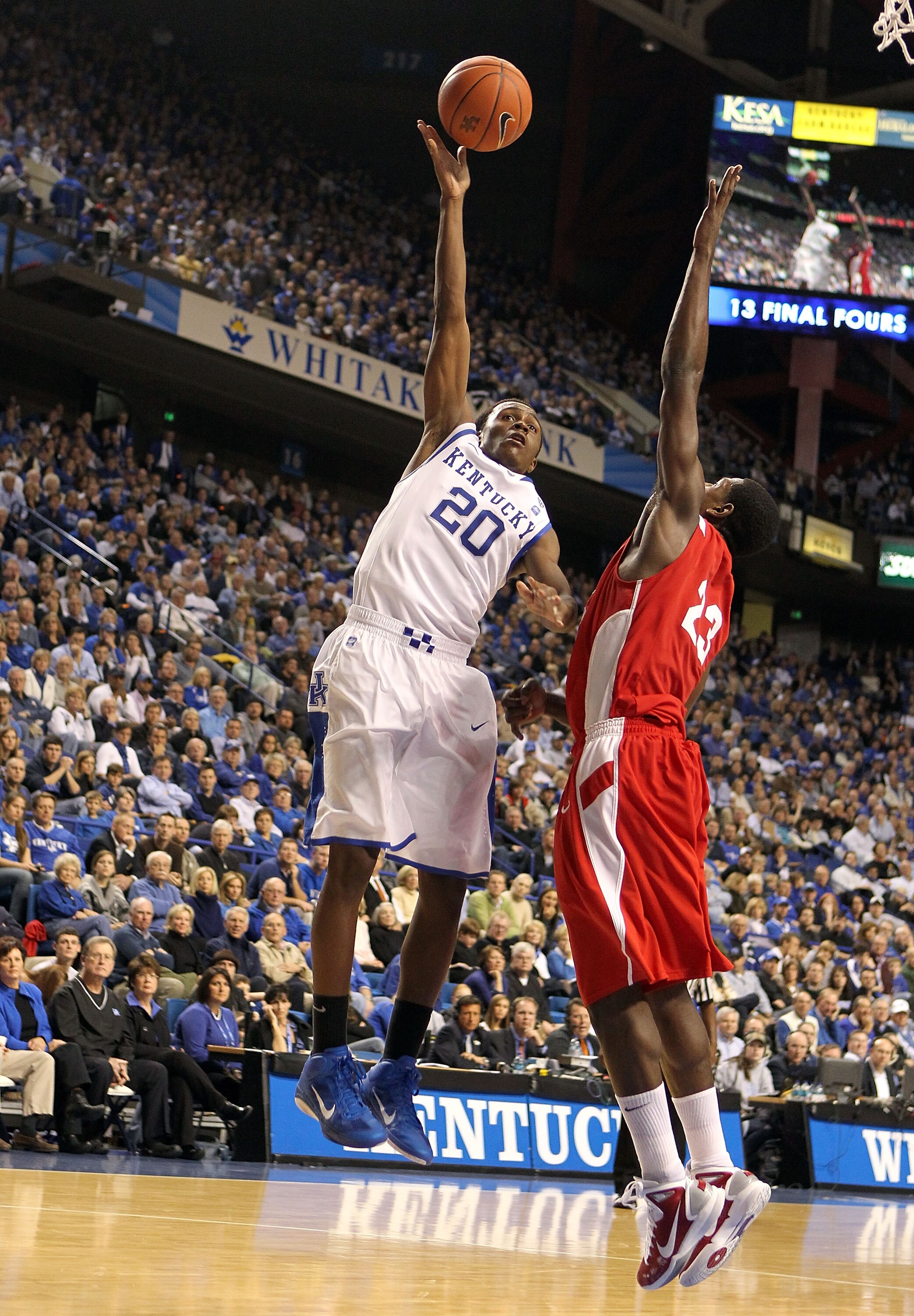 LEXINGTON, KY - NOVEMBER 30:  Doran Lamb #20 of the Kentucky Wildcats shoots the ball while defended by John Holland #20 of the Boston University Terriers during the game on November 30, 2010 in Lexington, Kentucky.  (Photo by Andy Lyons/Getty Images)