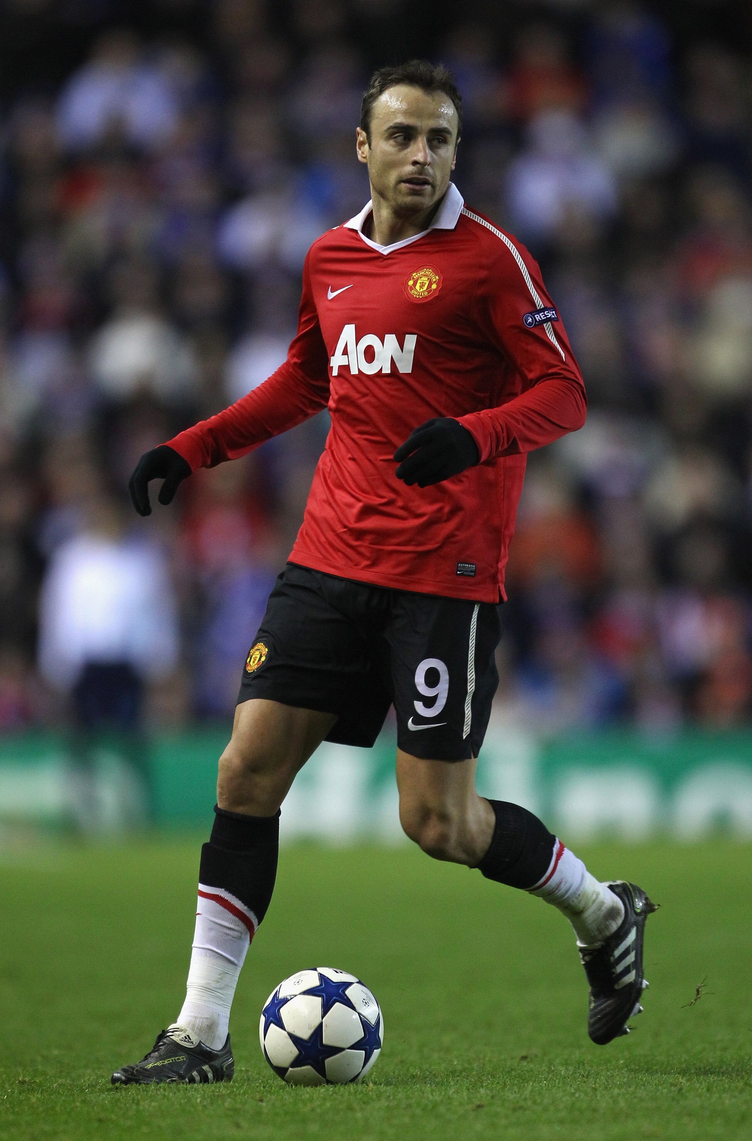 GLASGOW, SCOTLAND - NOVEMBER 24:  Dimitar Berbatov of Manchester United during the UEFA Champions League Group C match between Glasgow Rangers and Manchester United at Ibrox on November 24, 2010 in Glasgow, Scotland.  (Photo by Alex Livesey/Getty Images)