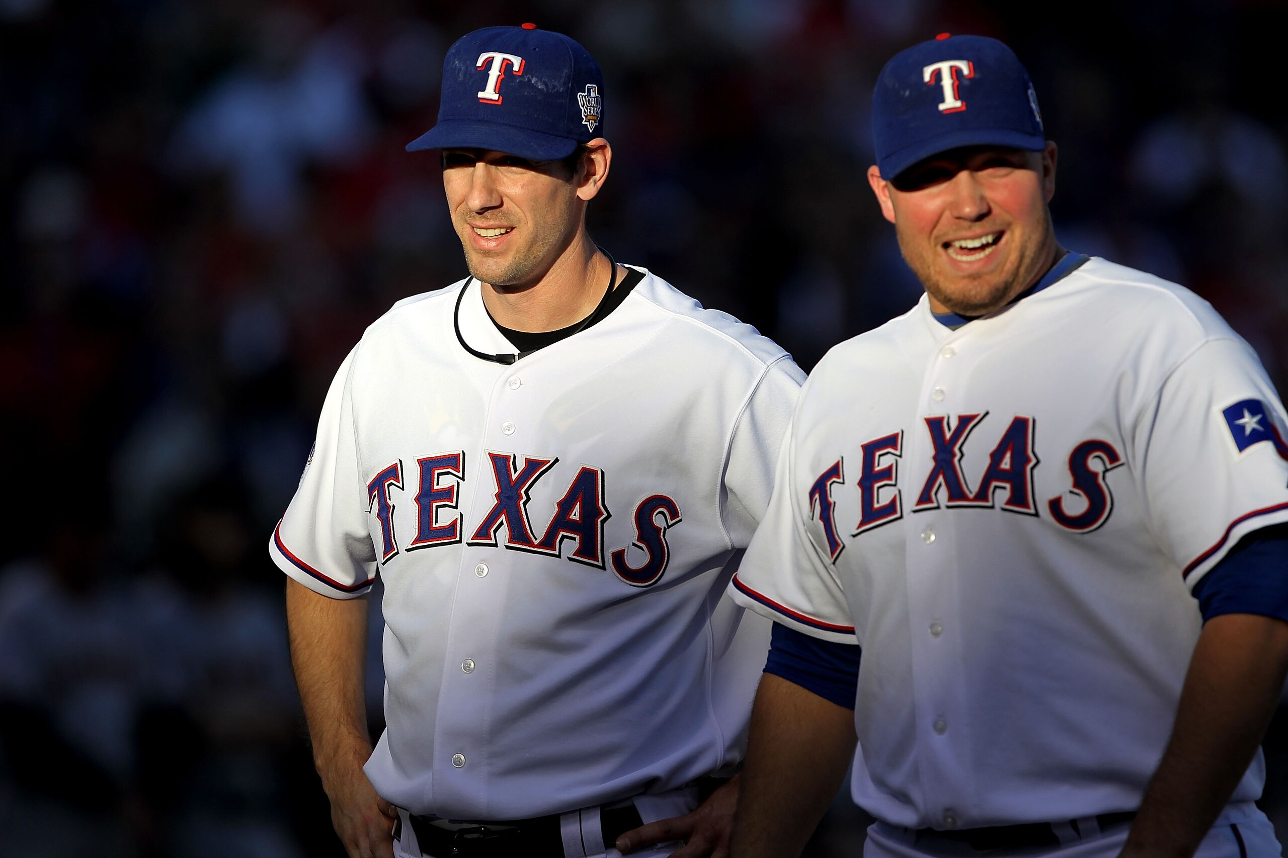 ARLINGTON, TX - OCTOBER 30:  Cliff Lee #33 and Tommy Hunter #35 of the Texas Rangers line up before taking on the San Francisco Giants in Game Three of the 2010 MLB World Series at Rangers Ballpark in Arlington on October 30, 2010 in Arlington, Texas.  (P