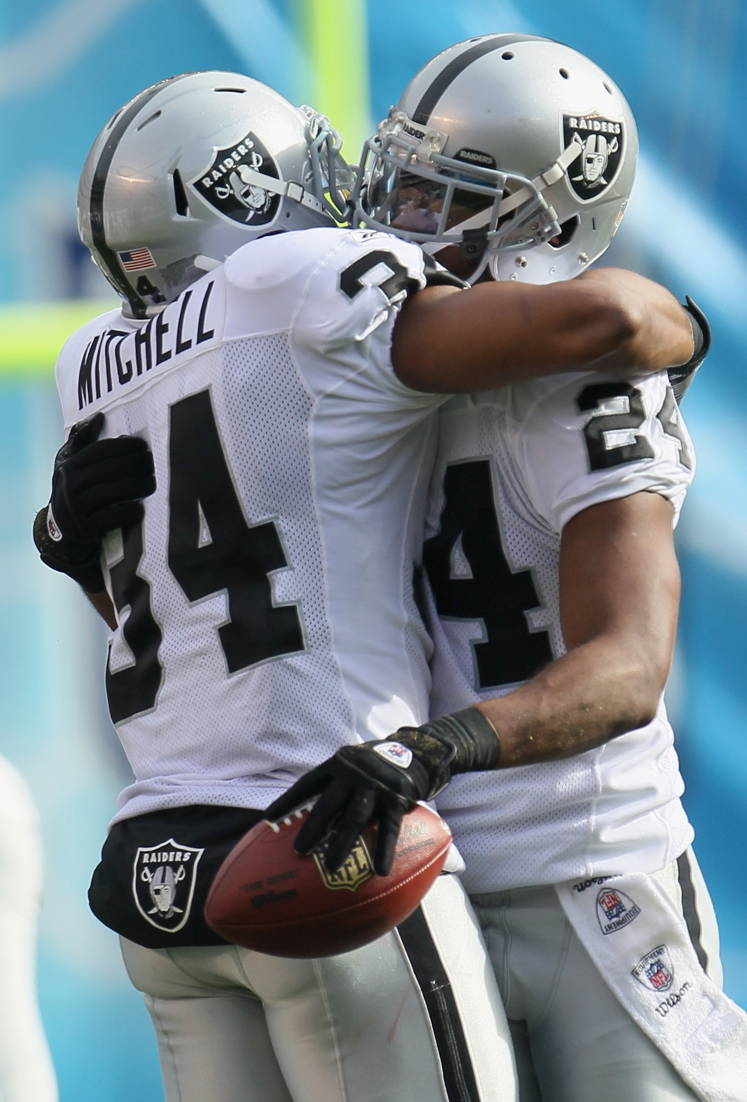 SAN DIEGO - DECEMBER 05: Safety Michael Huff (R) #24 the Oakland Raiders is congratulated by teammate Mike Mitchell #34 after intercepting a pass against the San Diego Chargers during the first quarter at Qualcomm Stadium on December 5, 2010 in San Diego SAN DIEGO - DECEMBER 05: Safety Michael Huff (R) #24 the Oakland Raiders is congratulated by teammate Mike Mitchell #34 after intercepting a pass against the San Diego Chargers during the first quarter at Qualcomm Stadium on December 5, 2010 in San Diego