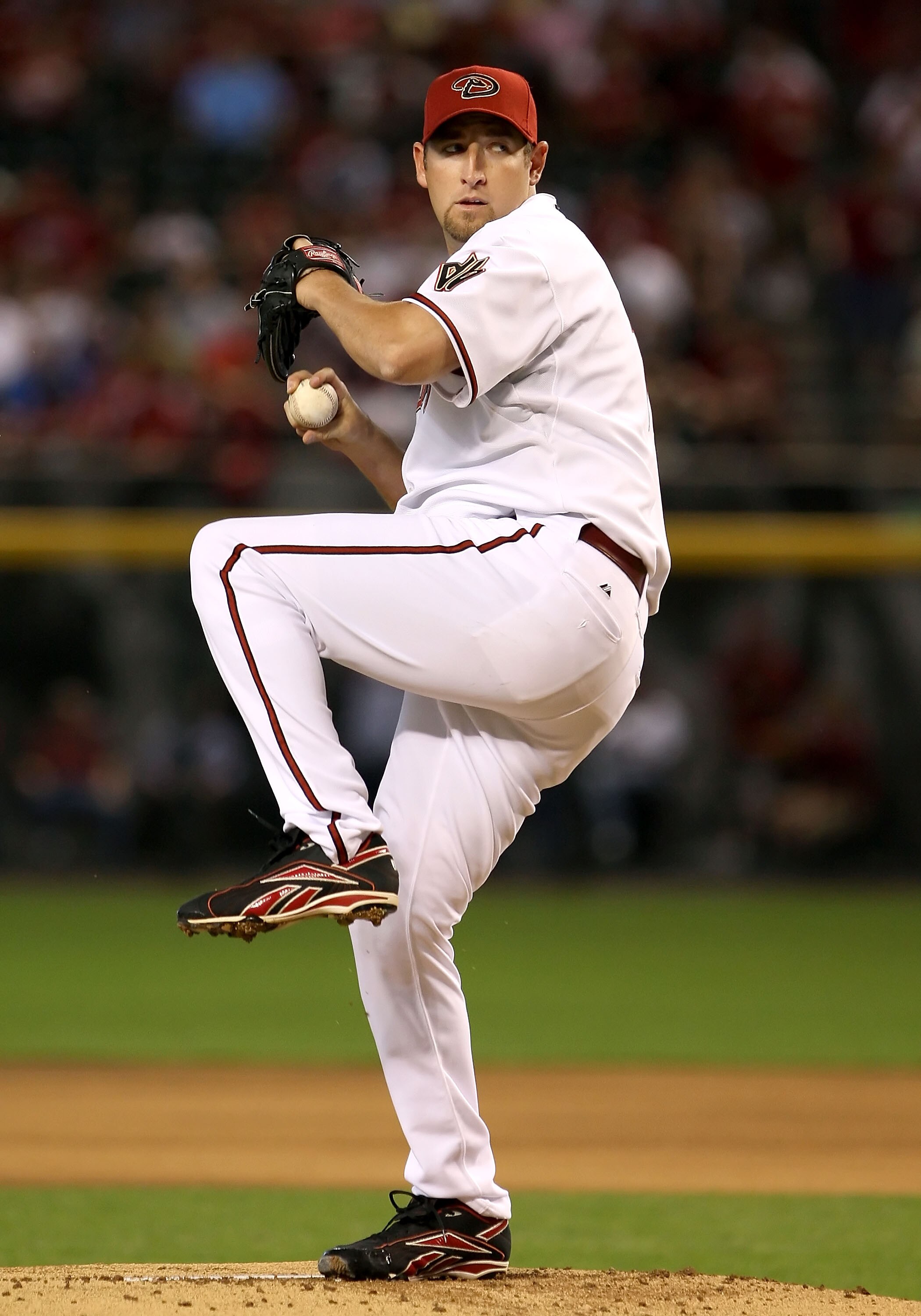 PHOENIX - APRIL 06:  Starting pitcher Brandon Webb #17 of the Arizona Diamondbacks pitches against the Colorado Rockies during the MLB openning day game at Chase Field on April 6, 2009 in Phoenix, Arizona.  The Diamondbacks defeated the Rockies 9-8. (Phot