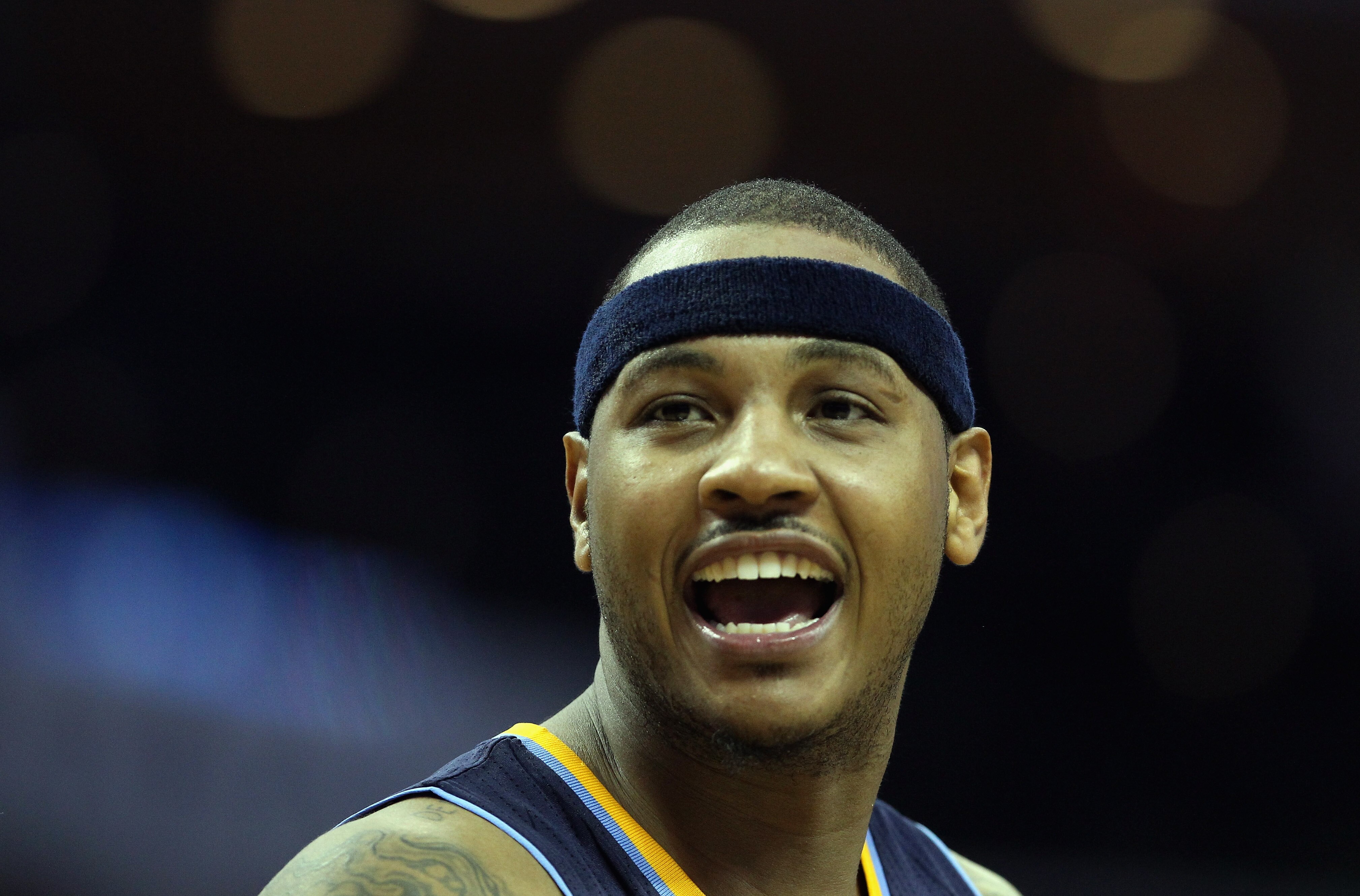 CHARLOTTE, NC - DECEMBER 07:  Carmelo Anthony #15 of the Denver Nuggets reacts to a call against the Charlotte Bobcats during their game at Time Warner Cable Arena on December 7, 2010 in Charlotte, North Carolina.  NOTE TO USER: User expressly acknowledge