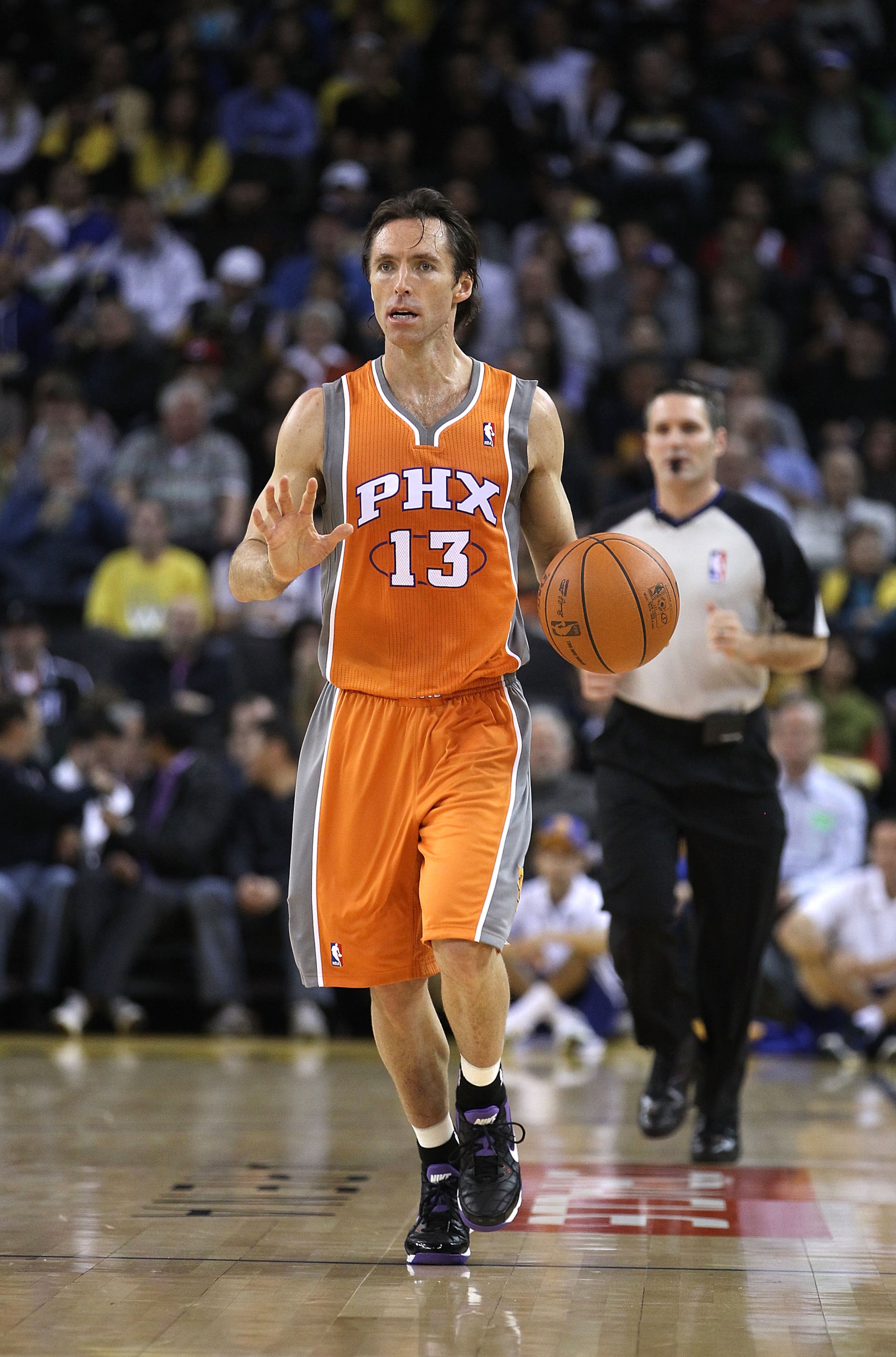 OAKLAND, CA - DECEMBER 02:  Steve Nash #13 of the Phoenix Suns in action against the Golden State Warriors at Oracle Arena on December 2, 2010 in Oakland, California. NOTE TO USER: User expressly acknowledges and agrees that, by downloading and or using t