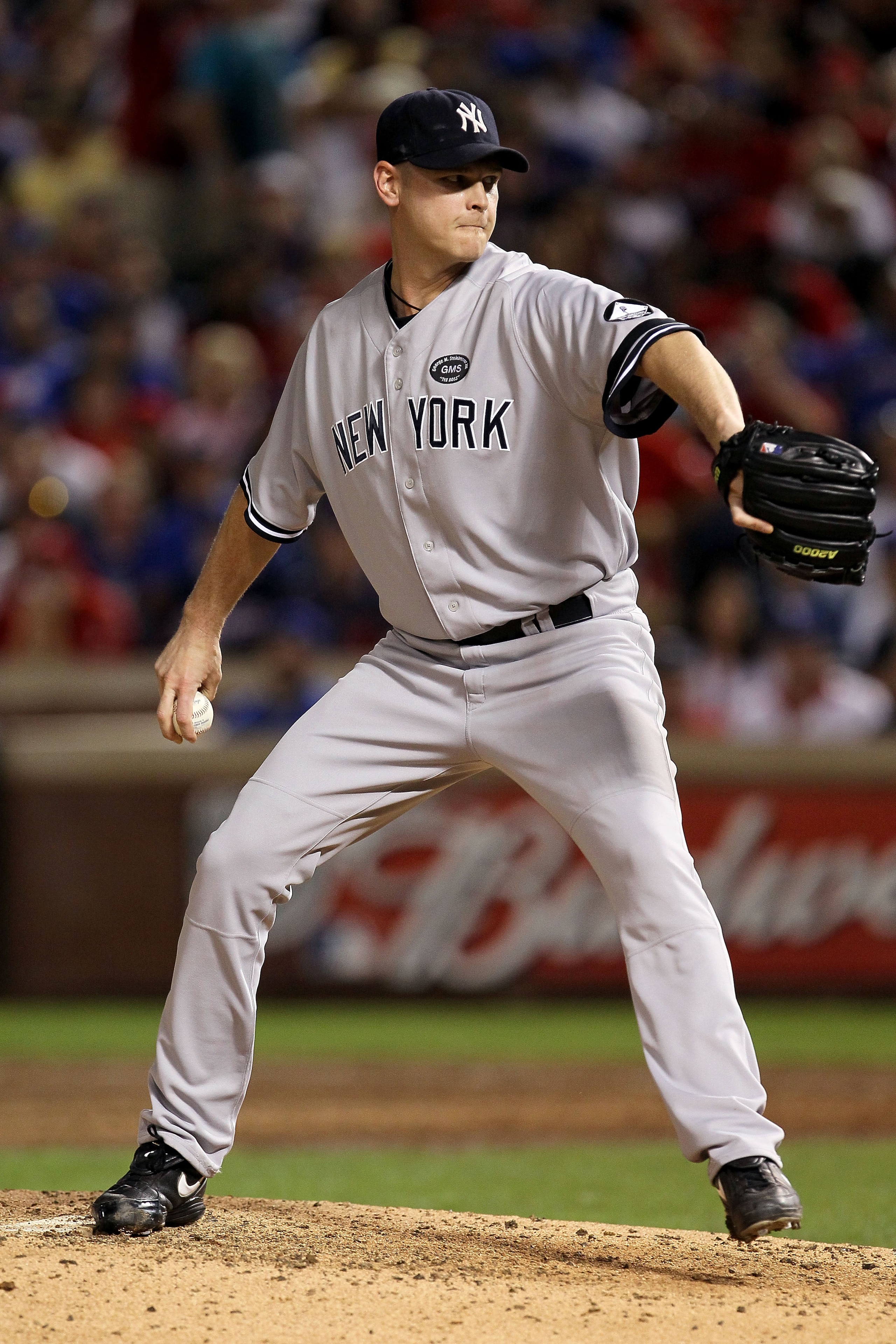 ARLINGTON, TX - OCTOBER 22: Kerry Wood #39 of the New York Yankees throws a pitch against the Texas Rangers in Game Six of the ALCS during the 2010 MLB Playoffs at Rangers Ballpark in Arlington on October 22, 2010 in Arlington, Texas. (Photo by Stephen ARLINGTON, TX - OCTOBER 22: Kerry Wood #39 of the New York Yankees throws a pitch against the Texas Rangers in Game Six of the ALCS during the 2010 MLB Playoffs at Rangers Ballpark in Arlington on October 22, 2010 in Arlington, Texas. (Photo by Stephen