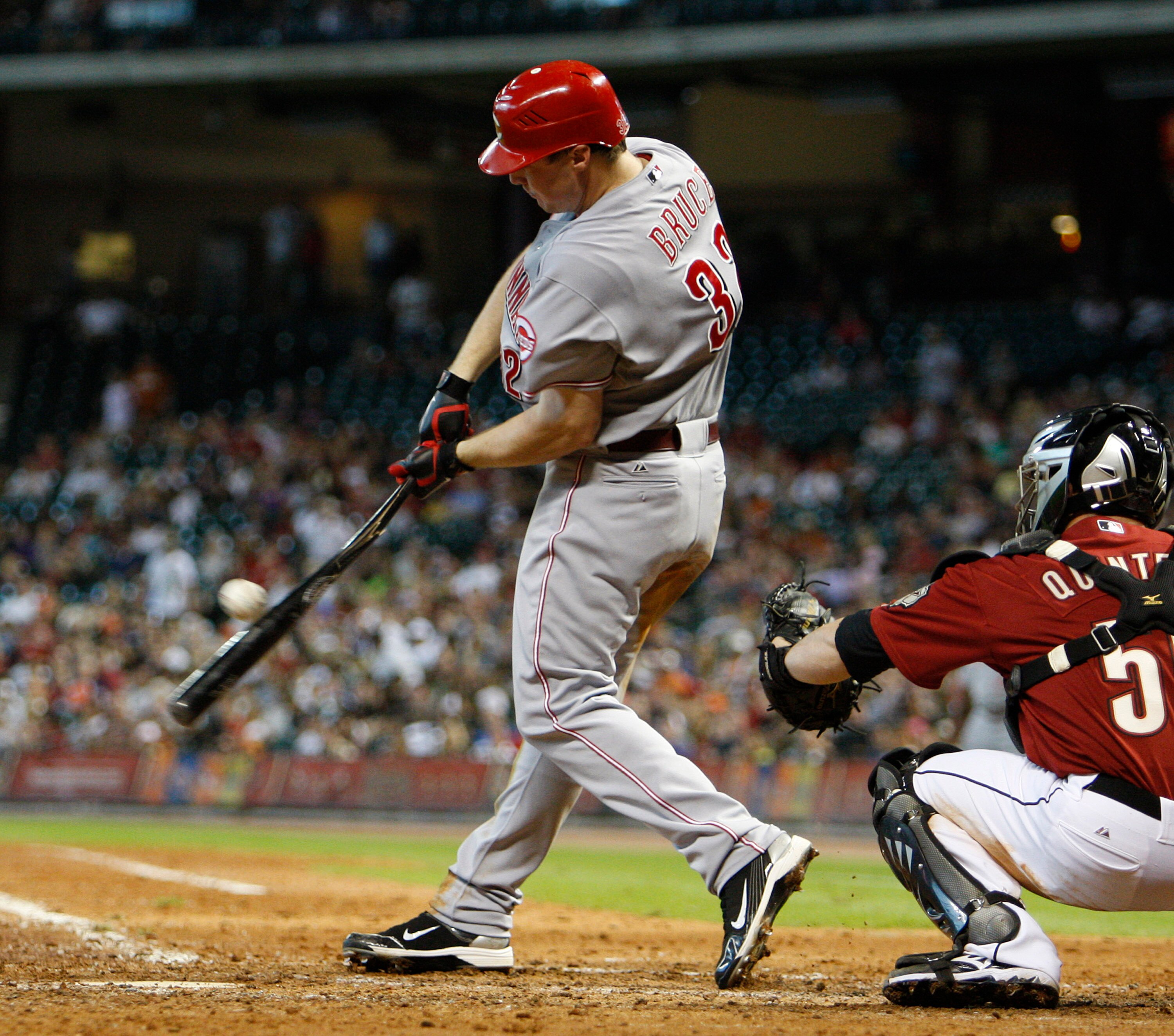 HOUSTON - SEPTEMBER 19:  Jay Bruce #32 of the Cincinnatti Reds breaks his bat as he singles to right field against the Houston Astros in the eighth inning at Minute Maid Park on September 19, 2010 in Houston, Texas.  (Photo by Bob Levey/Getty Images)
