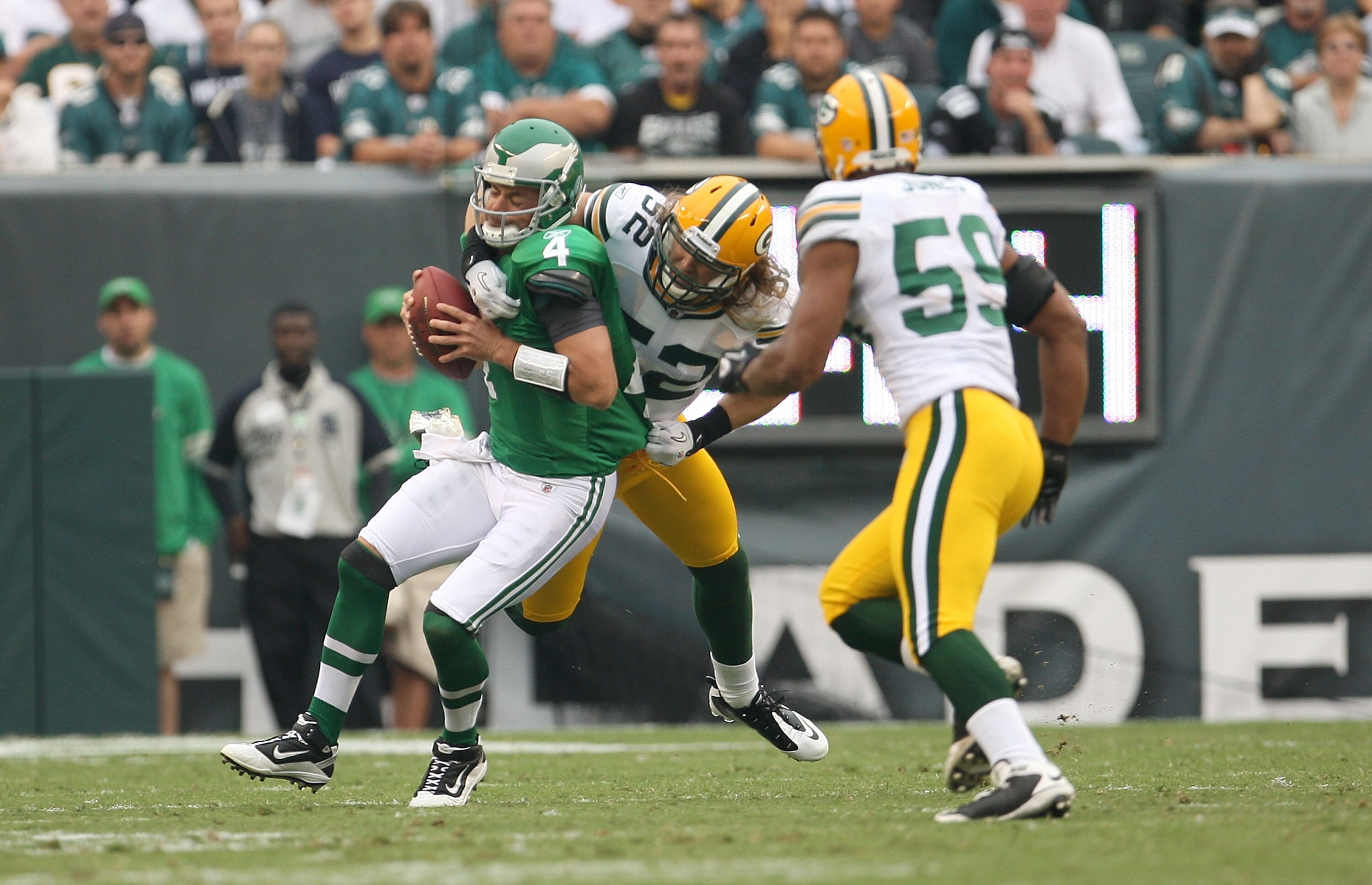 PHILADELPHIA - SEPTEMBER 12:  Kevin Kolb #4 of the Philadelphia Eagles is sacked by Clay Matthews #52 during a game against the Green Bay Packers at Lincoln Financial Field on September 12, 2010 in Philadelphia, Pennsylvania.  (Photo by Mike Ehrmann/Getty