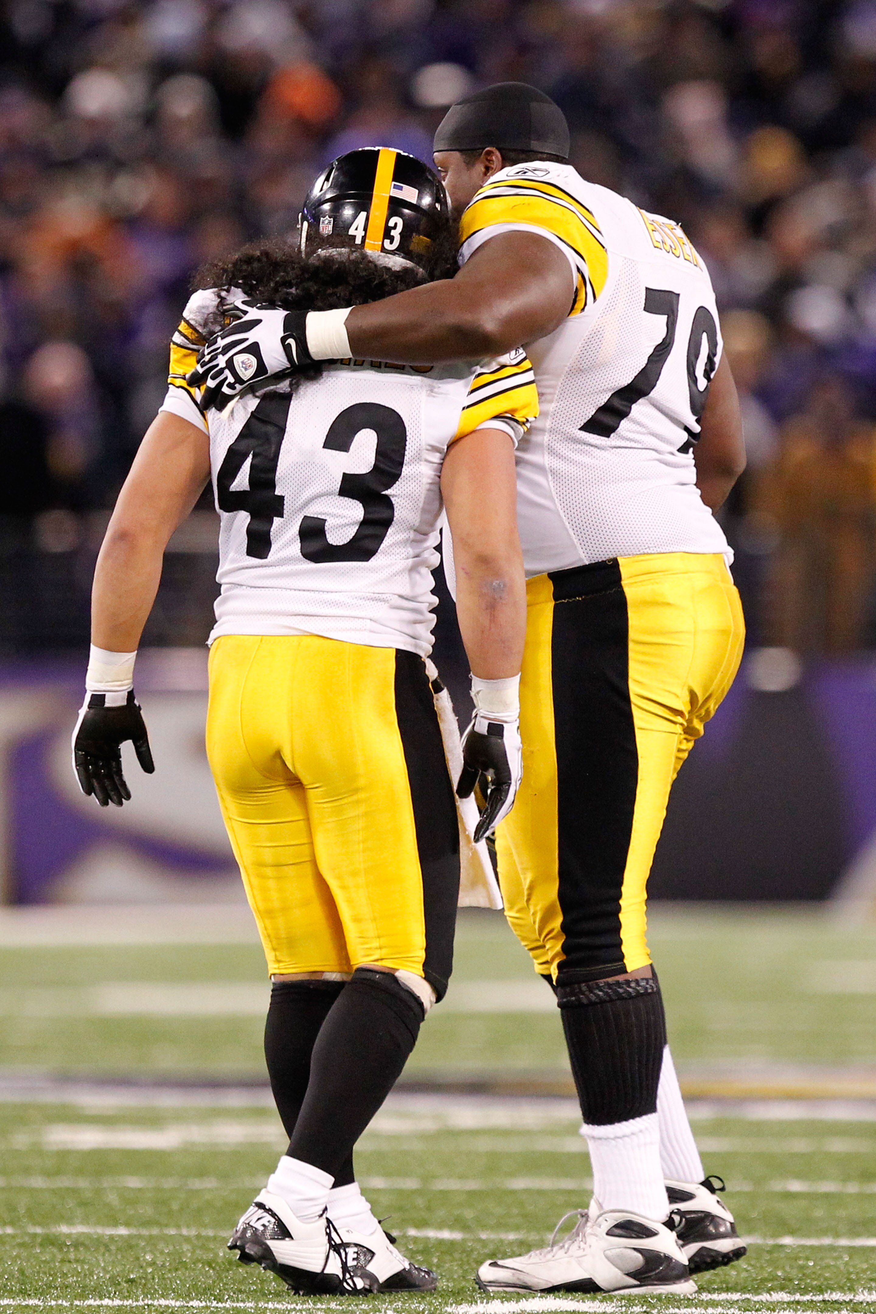 BALTIMORE, MD - DECEMBER 05:  Safety Troy Polamalu #43 of the Pittsburgh Steelers and teammate guard Trai Essex #79 celebrate defeating the Baltimore Ravens 13-10 at M&T Bank Stadium on December 5, 2010 in Baltimore, Maryland.  (Photo by Geoff Burke/Getty