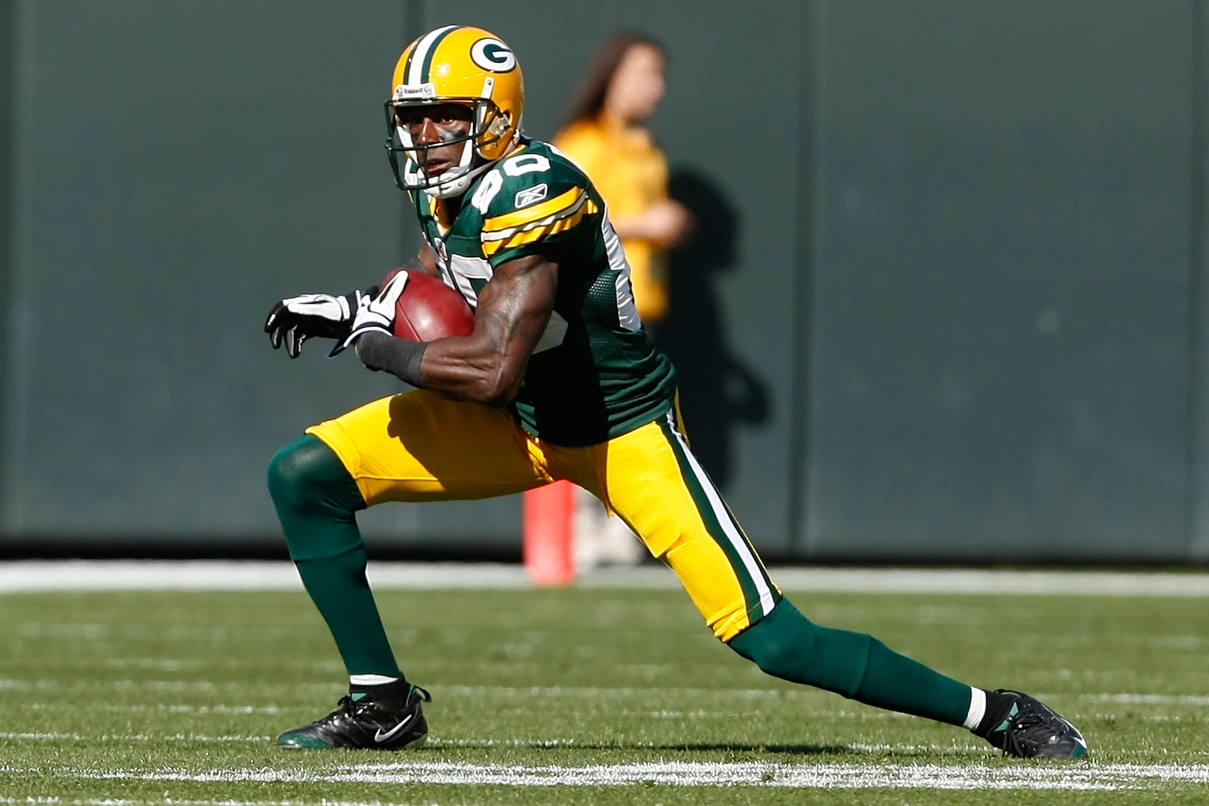 GREEN BAY, WI - OCTOBER 17: Donald Driver #80 of the Green Bay Packers runs against the Miami Dolphins at Lambeau Field on October 17, 2010 in Green Bay, Wisconsin. (Photo by Scott Boehm/Getty Images)