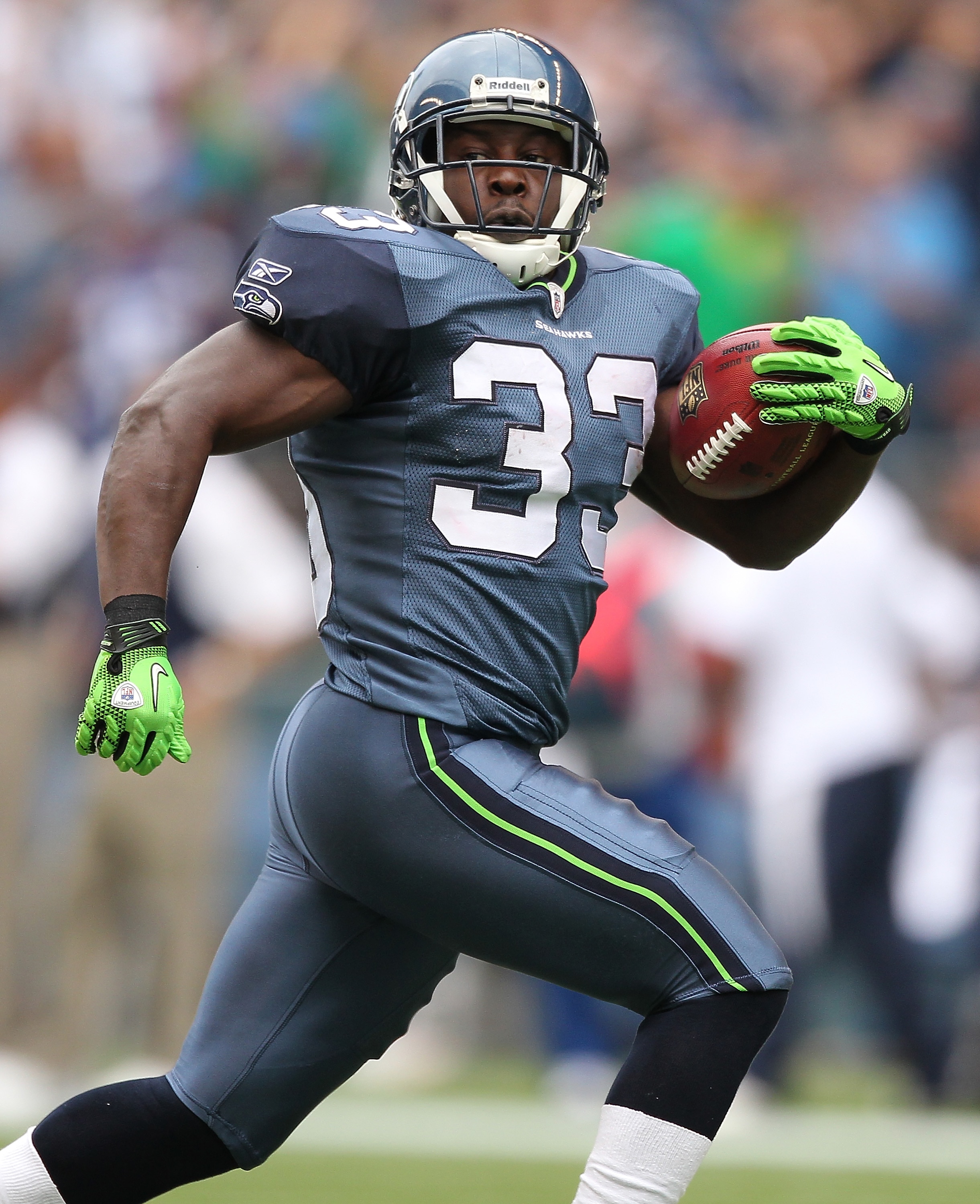 SEATTLE - SEPTEMBER 26:  Kick returner Leon Washington #33 of the Seattle Seahawks rushes for a 101 yard kickoff return for a touchdown in the third quarter against the San Diego Chargers at Qwest Field on September 26, 2010 in Seattle, Washington. The Se