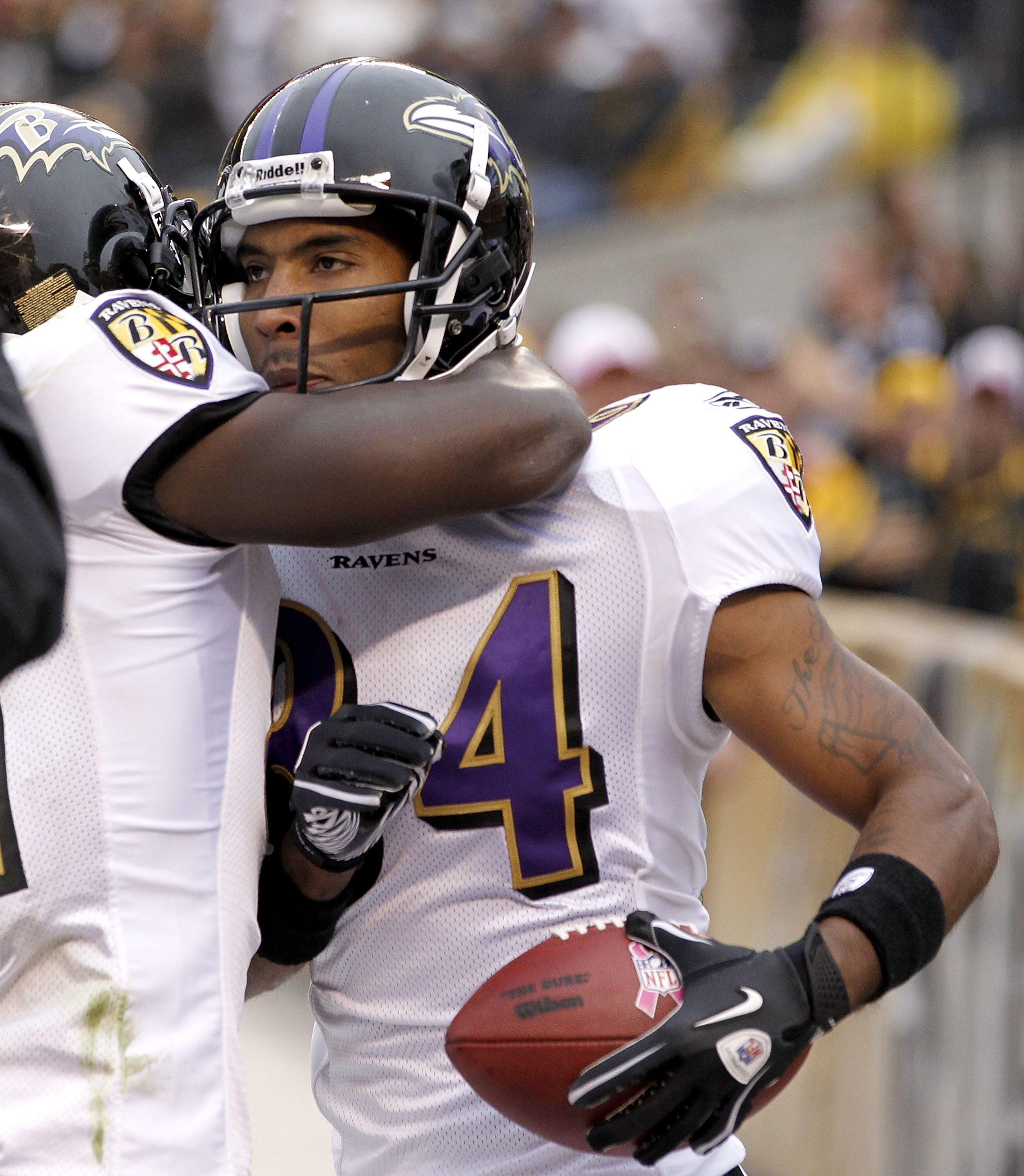 PITTSBURGH - OCTOBER 03:  T.J. Houshmandzadeh #84 of the Baltimore Ravens celebrates his game winning touchdown with Anquan Boldin #81 while playing the Pittsburgh Steelers on October 3, 2010 at Heinz Field in Pittsburgh, Pennsylvania.  (Photo by Gregory