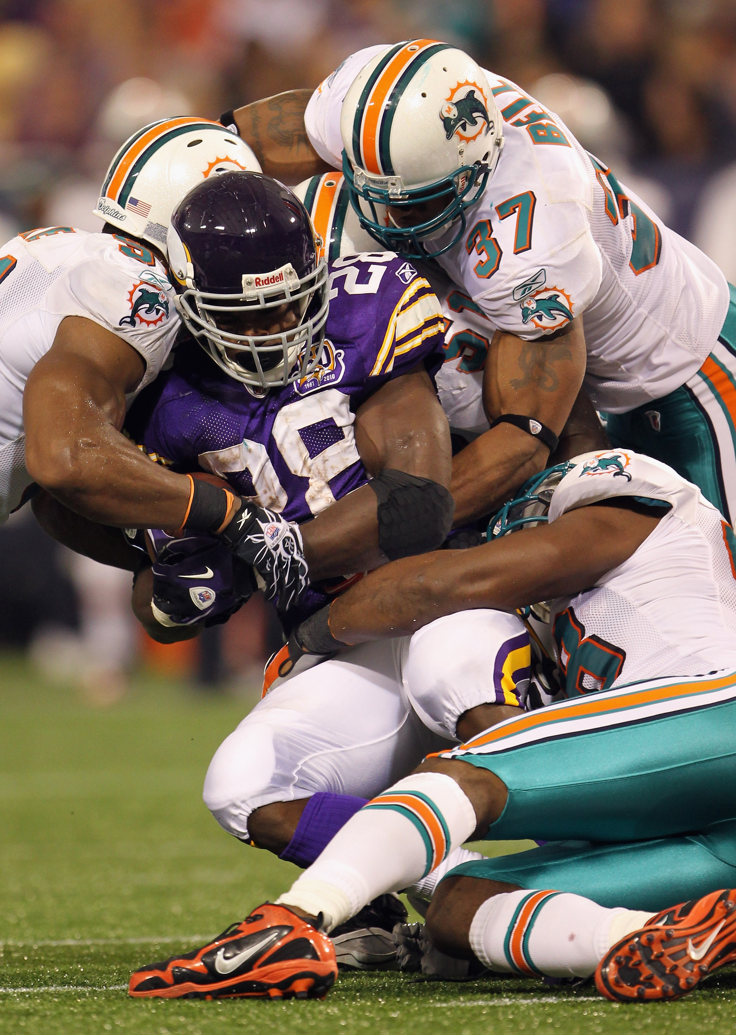 MINNEAPOLIS - SEPTEMBER 19:  Running back Adrian Peterson #28 of the Minnesota Vikings in action during the game against  of the Miami Dolphins on September 19, 2010 at Hubert H. Humphrey Metrodome in Minneapolis, Minnesota.  (Photo by Jamie Squire/Getty