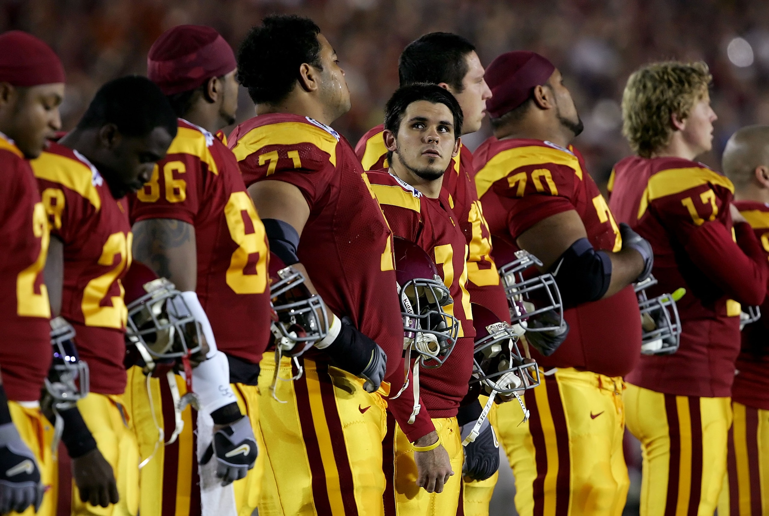 PASADENA, CA - JANUARY 04:  Kicker Mario Danelo #19, center, of the USC Trojans looks to the stands during the national anthem before the start of the BCS National Championship Rose Bowl Game between the Trojans and the Texas Longhorns at the Rose Bowl on