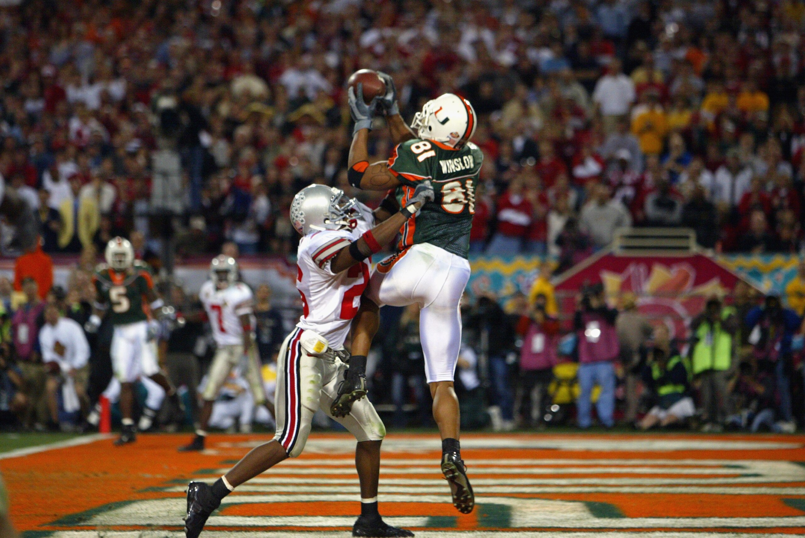 TEMPE, AZ - JANUARY 3:  Tight end Kellen Winslow #81 of the University of Miami Hurricanes catches the team's only overtime touchdown against the Ohio State Buckeyes during the Tostitos Fiesta Bowl at Sun Devil Stadium on January 3, 2003 in Tempe, Arizona