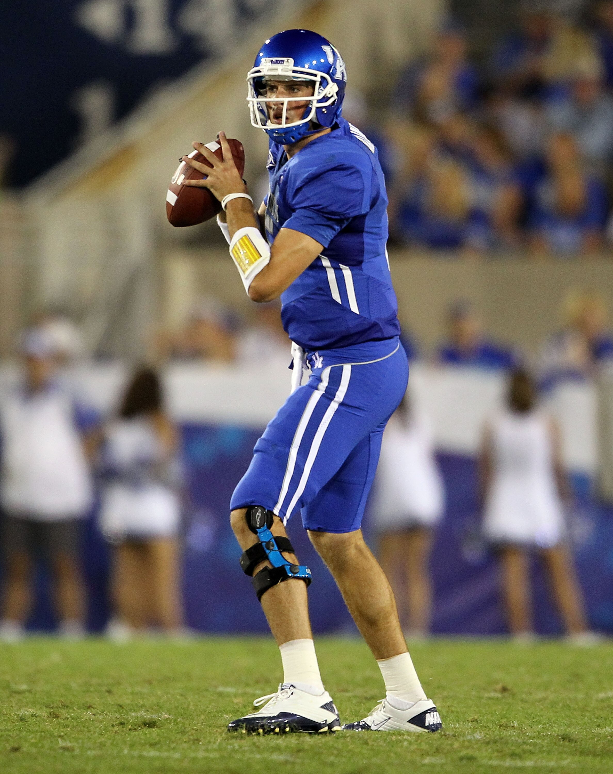 LEXINGTON, KY - SEPTEMBER 18:  Mike Hartline #5 of the Kentucky Wildcats throws a pass during the game against the Akron Zips at Commonwealth Stadium on September 18, 2010 in Lexington, Kentucky.  (Photo by Andy Lyons/Getty Images)