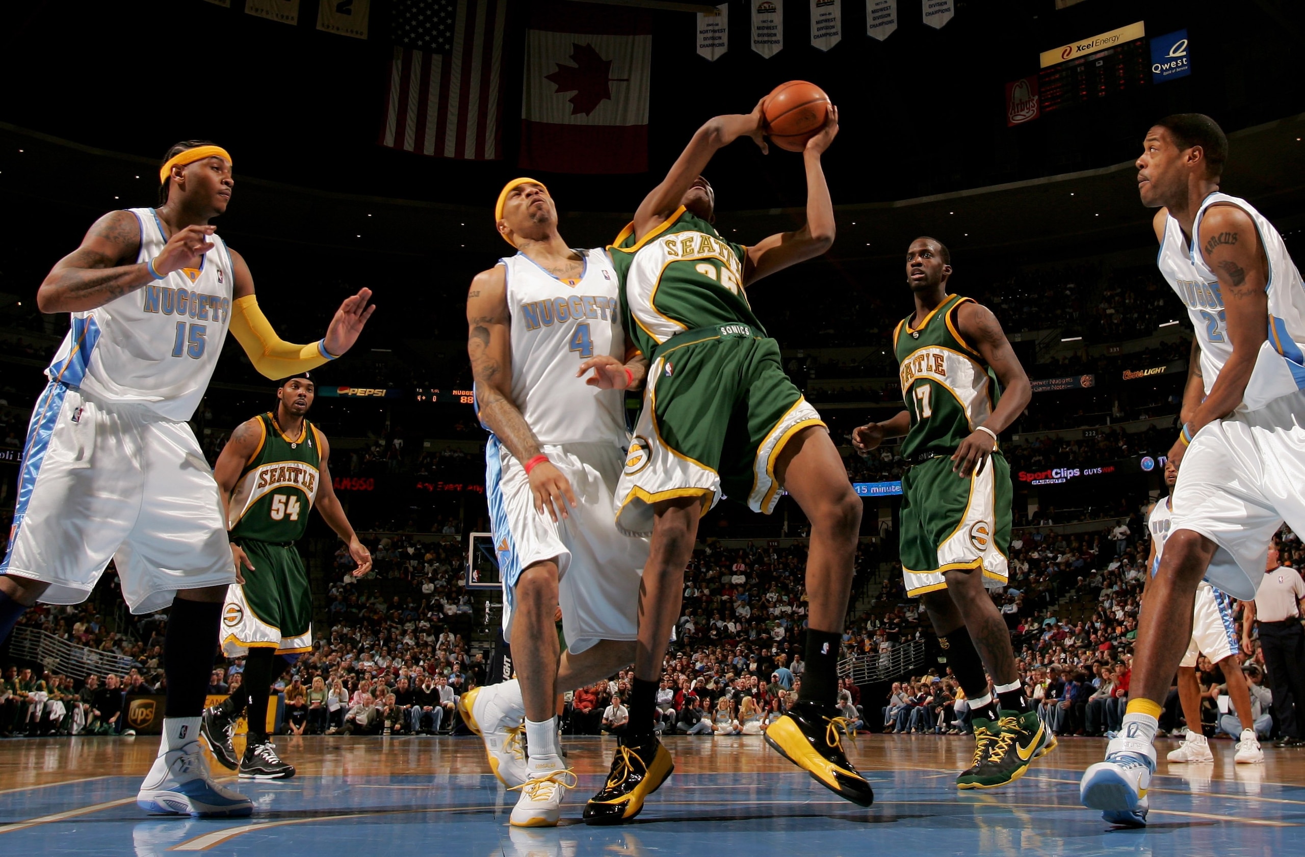 DENVER - MARCH 16:  Kevin Durant #35 of the Seattle SuperSonics tries to get off a shot against Kenyon Martin #4 of the Denver Nuggets at the Pepsi Center on March 16, 2008 in Denver, Colorado. The Nuggets defeated the Sonics 168-116. NOTE TO USER: User e