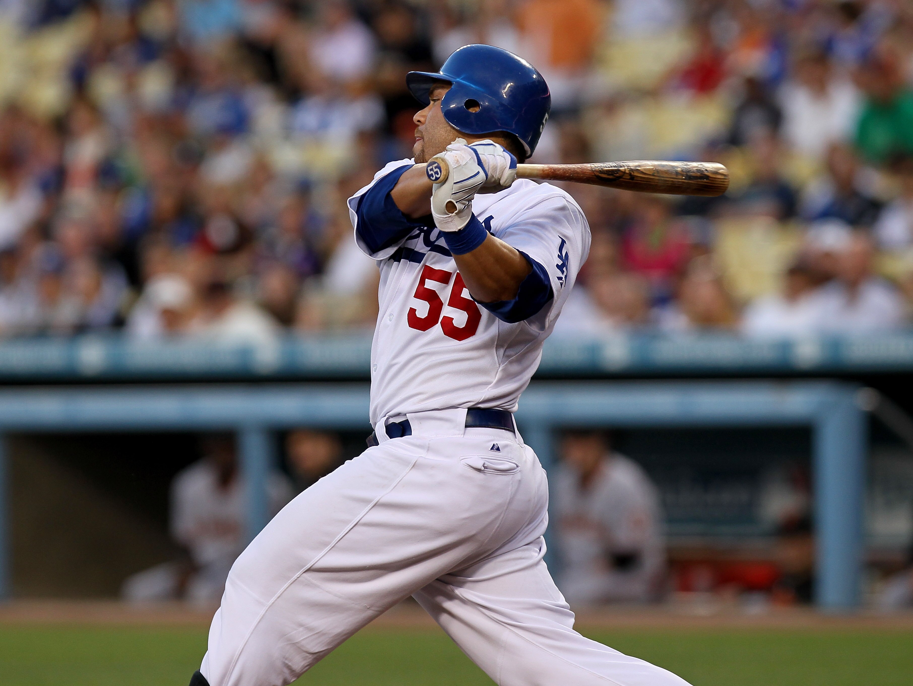 LOS ANGELES, CA - JULY 21:  Russell Martin #55 of the Los Angeles Dodgers bats against the San Francisco Giants on July 21, 2010 at Dodger Stadium in Los Angeles, California.  The Dodgers won 2-0.  (Photo by Stephen Dunn/Getty Images)