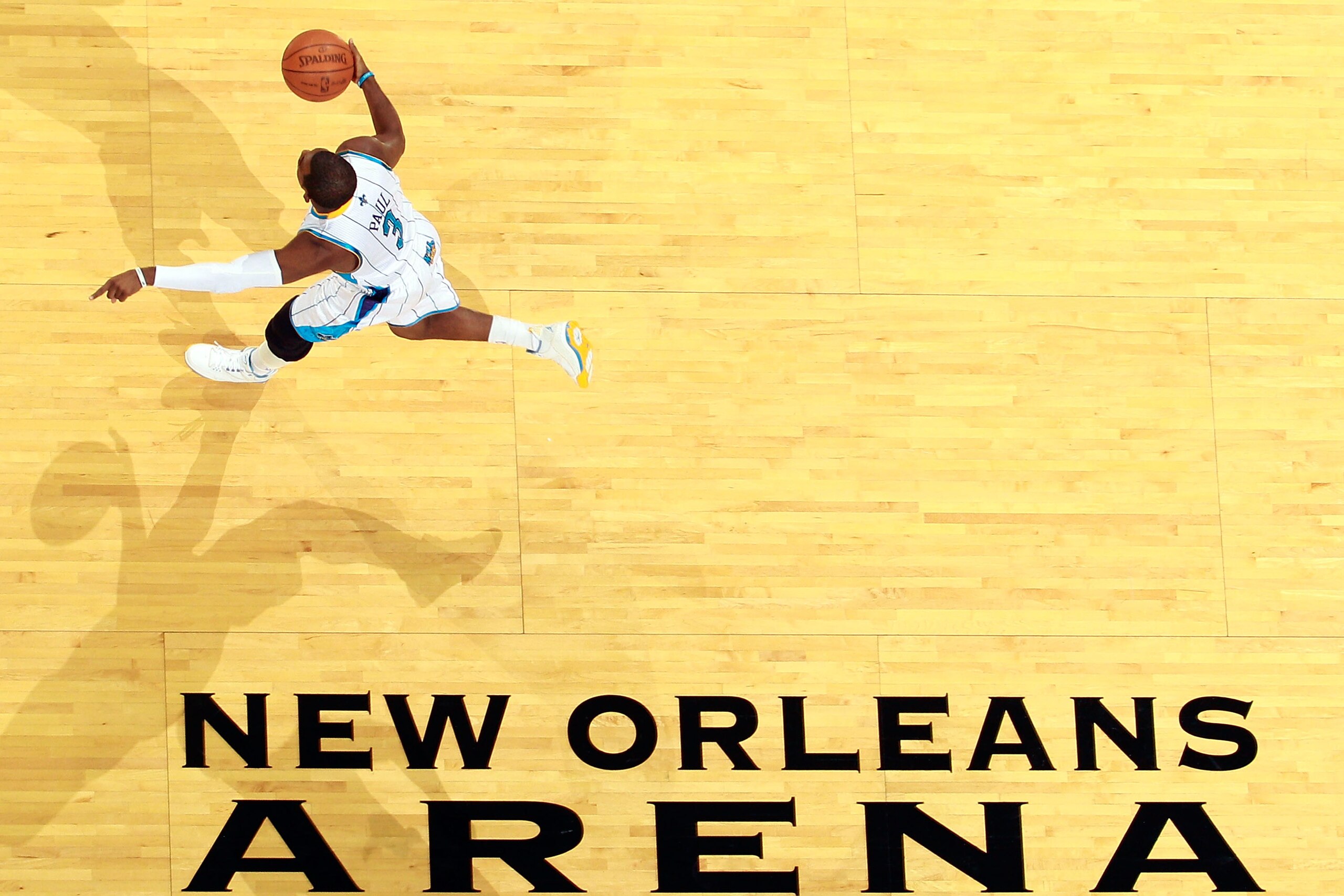 NEW ORLEANS, LA - DECEMBER 08:  Chris Paul #3 of the New Orleans Hornets drives the ball up the court during the game against the Detroit Pistons at the New Orleans Arena on December 8, 2010 in New Orleans, Louisiana.  NOTE TO USER: User expressly acknowl