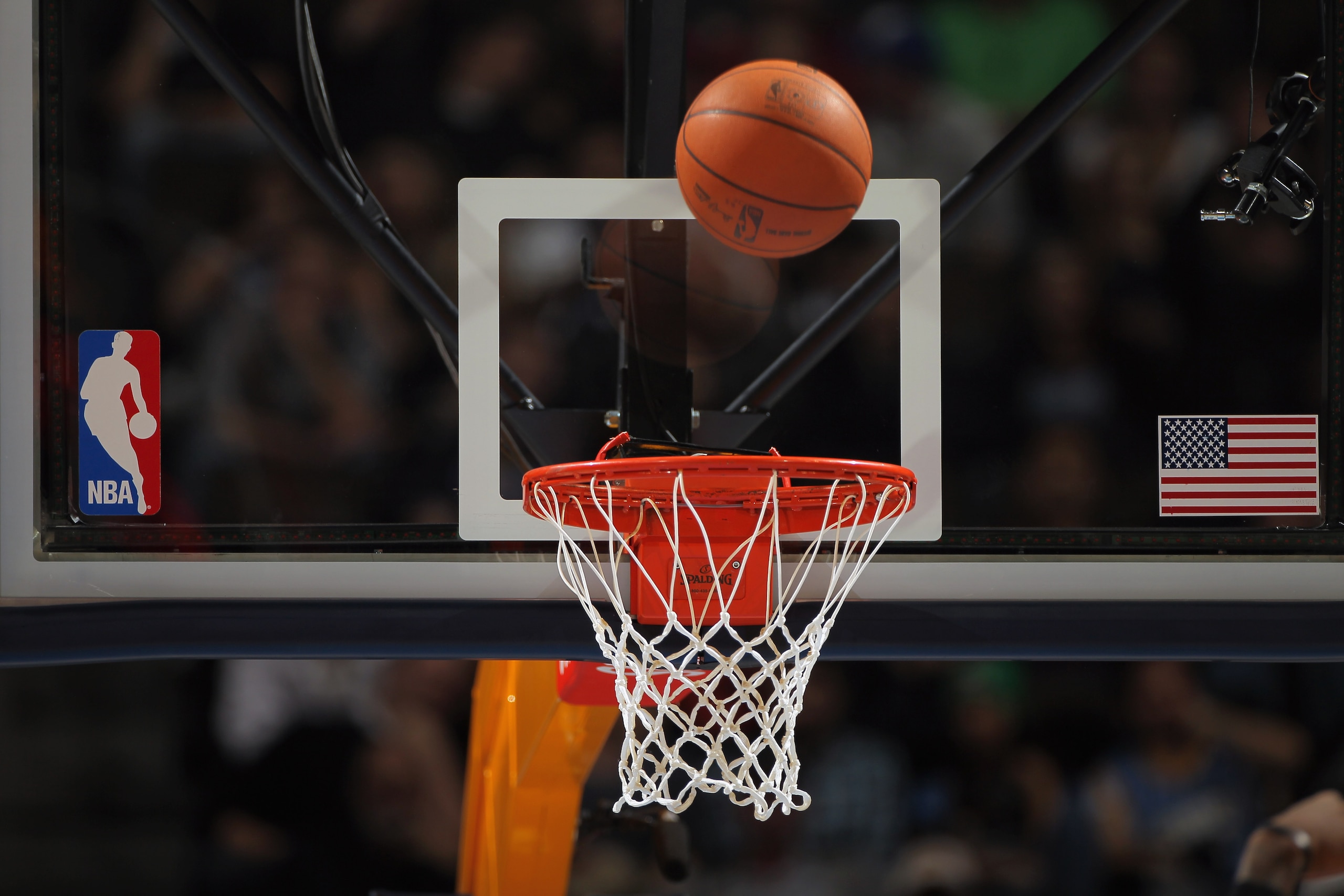 DENVER - NOVEMBER 16:  A detail photo of the ball as it falls through the rim as the Denver Nuggets face the New York Knicks at the Pepsi Center on November 16, 2010 in Denver, Colorado. The Nuggets defeated the Knicks 120-118. NOTE TO USER: User expressl