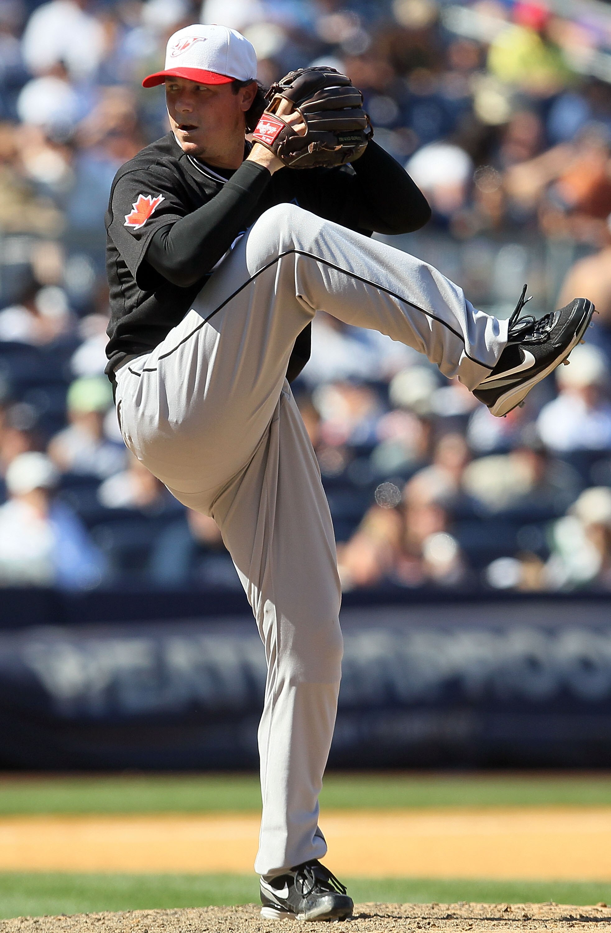 NEW YORK - JULY 04:  Scott Downs #37 of the Toronto Blue Jays delivers a pitch against the New York Yankees on July 4, 2010 at Yankee Stadium in the Bronx borough of New York City.  (Photo by Jim McIsaac/Getty Images)