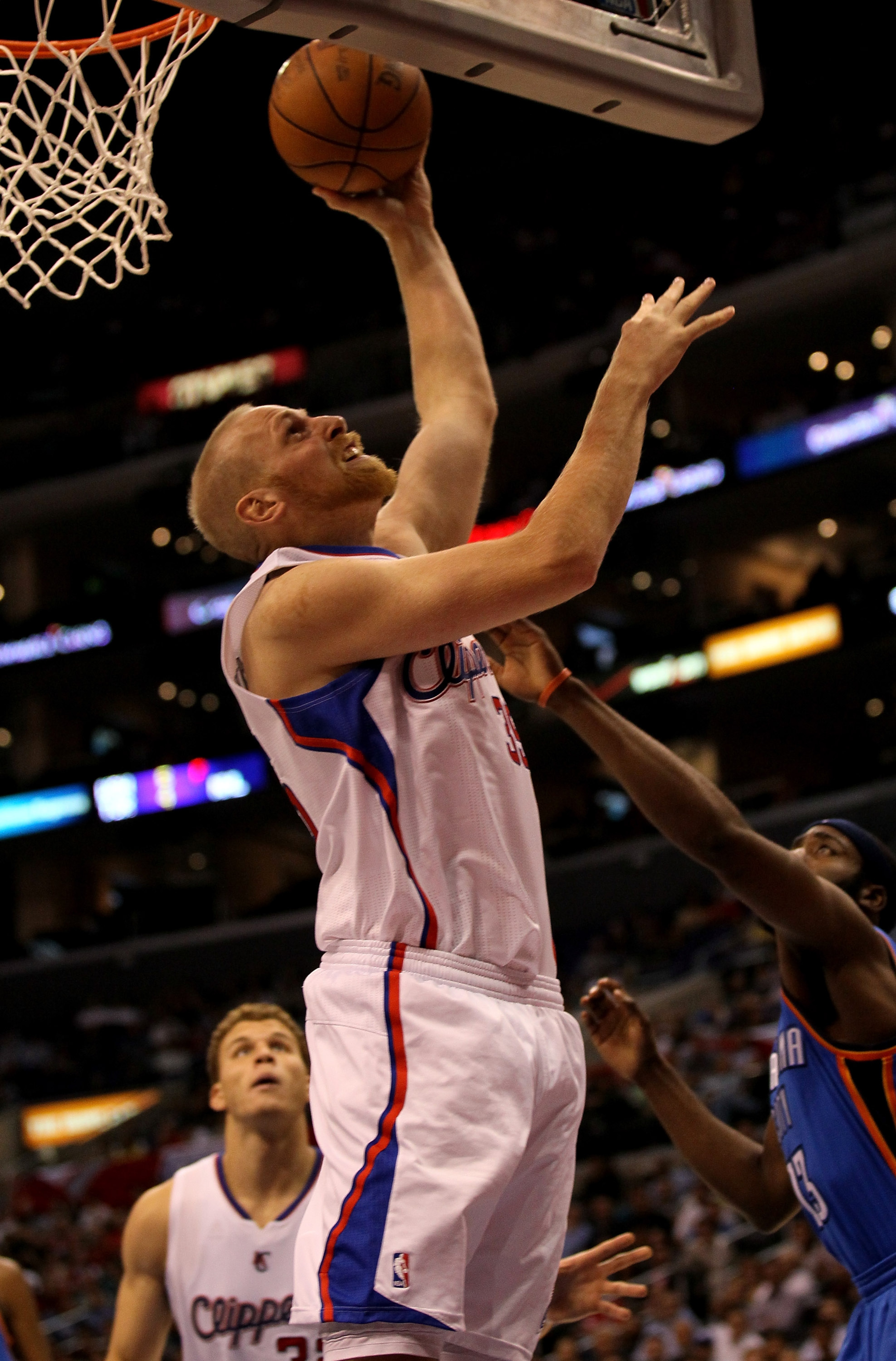 LOS ANGELES - NOVEMBER 3: Chris Kaman #35 of the Los Angeles Clippers shoots against the Oklahoma City Thunder at Staples Center on November 3, 2010 in Los Angeles, California. The Clippers won 107-92. NOTE TO USER: User expressly acknowledges and agrees LOS ANGELES - NOVEMBER 3: Chris Kaman #35 of the Los Angeles Clippers shoots against the Oklahoma City Thunder at Staples Center on November 3, 2010 in Los Angeles, California. The Clippers won 107-92. NOTE TO USER: User expressly acknowledges and agrees