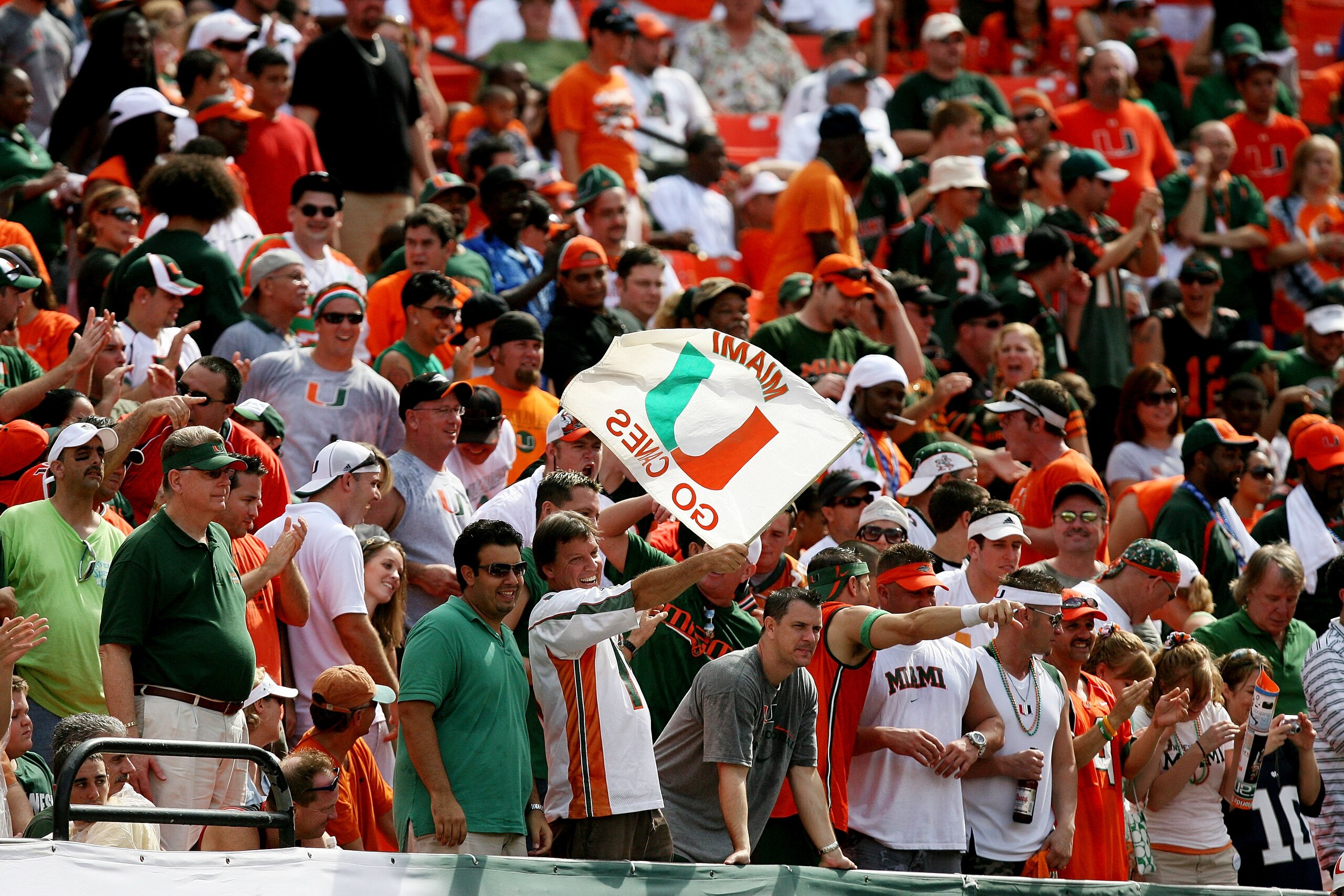 MIAMI - OCTOBER 25:  Hurricane fans cheer on the defense as the Wake Forest Demon Decons take on the Miami Hurricanes at Dolphin Stadium on October 25, 2008 in Miami, Florida.  (Photo by Doug Benc/Getty Images)