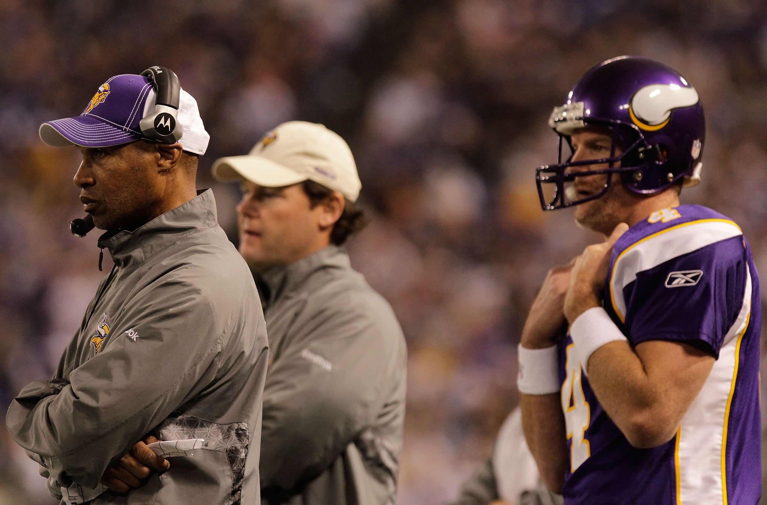 MINNEAPOLIS, MN - DECEMBER 05:  Head coach of the Minnesota Vikings, Leslie Frazier stands in front of Brett Favre #4 as they both look on from the sideline against the Buffalo Bills at the Mall of America Field at the Hubert H. Humphrey Metrodome on Dece