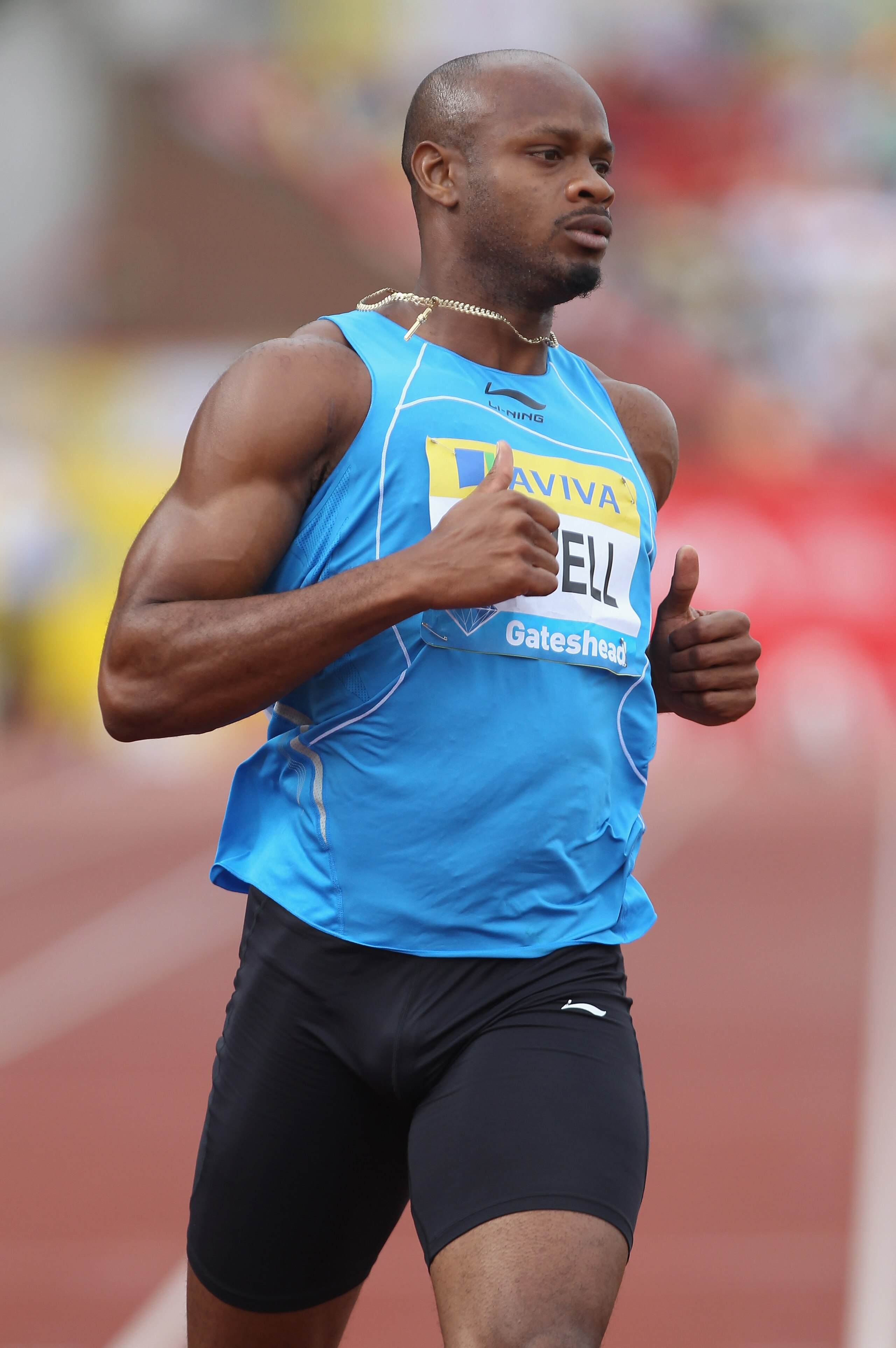 GATESHEAD, ENGLAND - JULY 10:  Asafa Powell of Jamaica in action in the Men's 100m heats during the Aviva British Grand Prix at Gateshead International Stadium on July 10, 2010 in Gateshead, England.  (Photo by Ian Walton/Getty Images)
