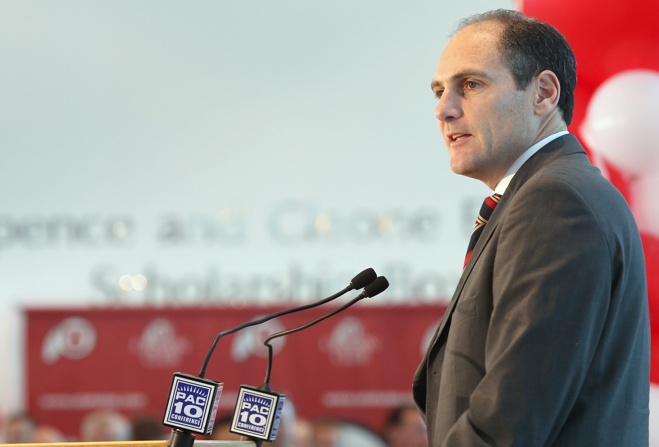 SALT LAKE CITY, UT - JUNE 17: PAC-10 Commissioner Larry Scott talks to the press after admitting the University of Utah into the PAC-10 June 17, 2010 in Salt Lake City, Utah. The University of Utah was invited to join the PAC-10 for the 2011-12 athletic y