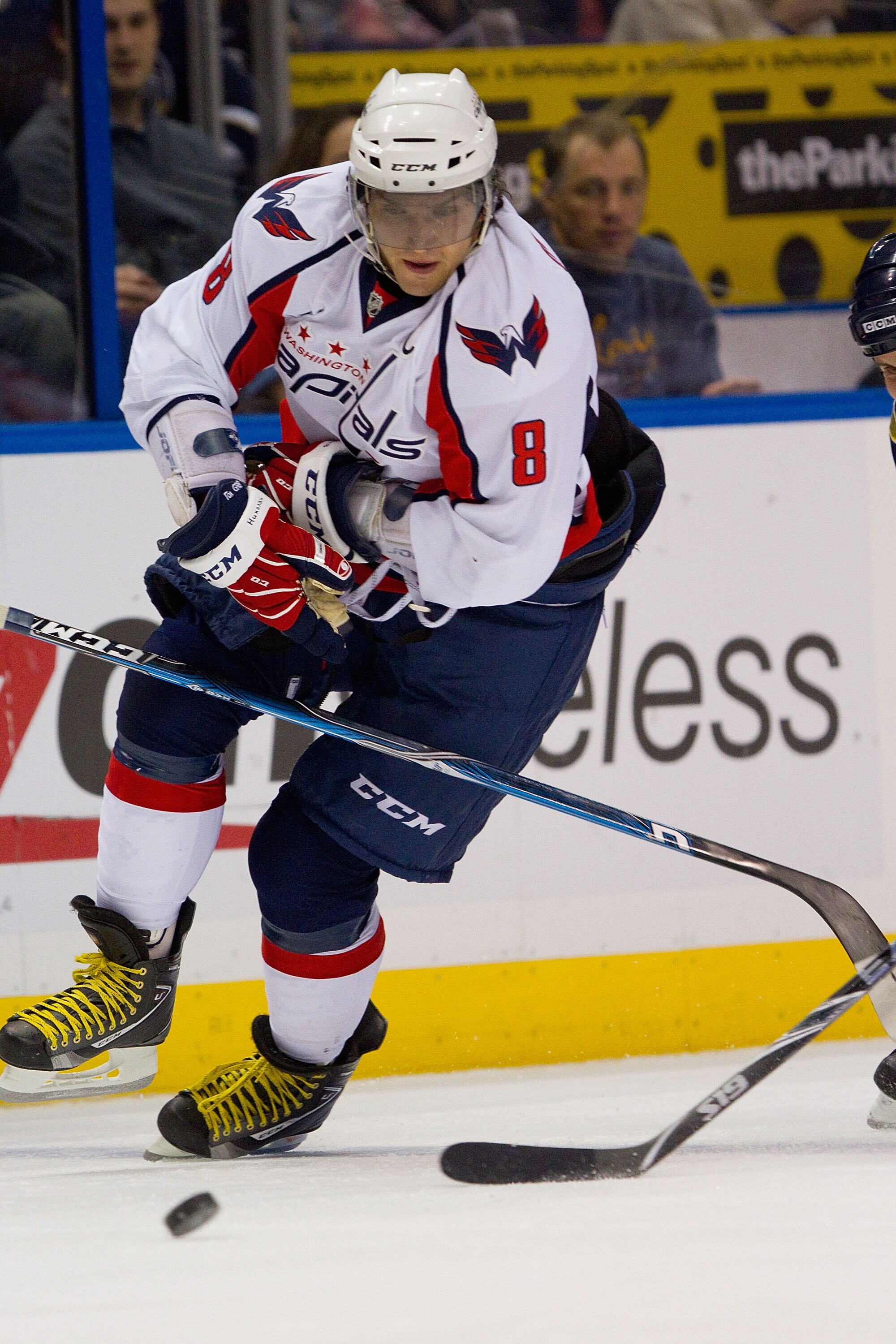 ST. LOUIS, MO - DECEMBER 01: Alex Ovechkin #8 of the Washington Capitals looses his stick as he moves the puck up the ice against the St. Louis Blues at the Scottrade Center on December 1, 2010 in St. Louis, Missouri.  The Capitals beat the Blues 4-1.  (P