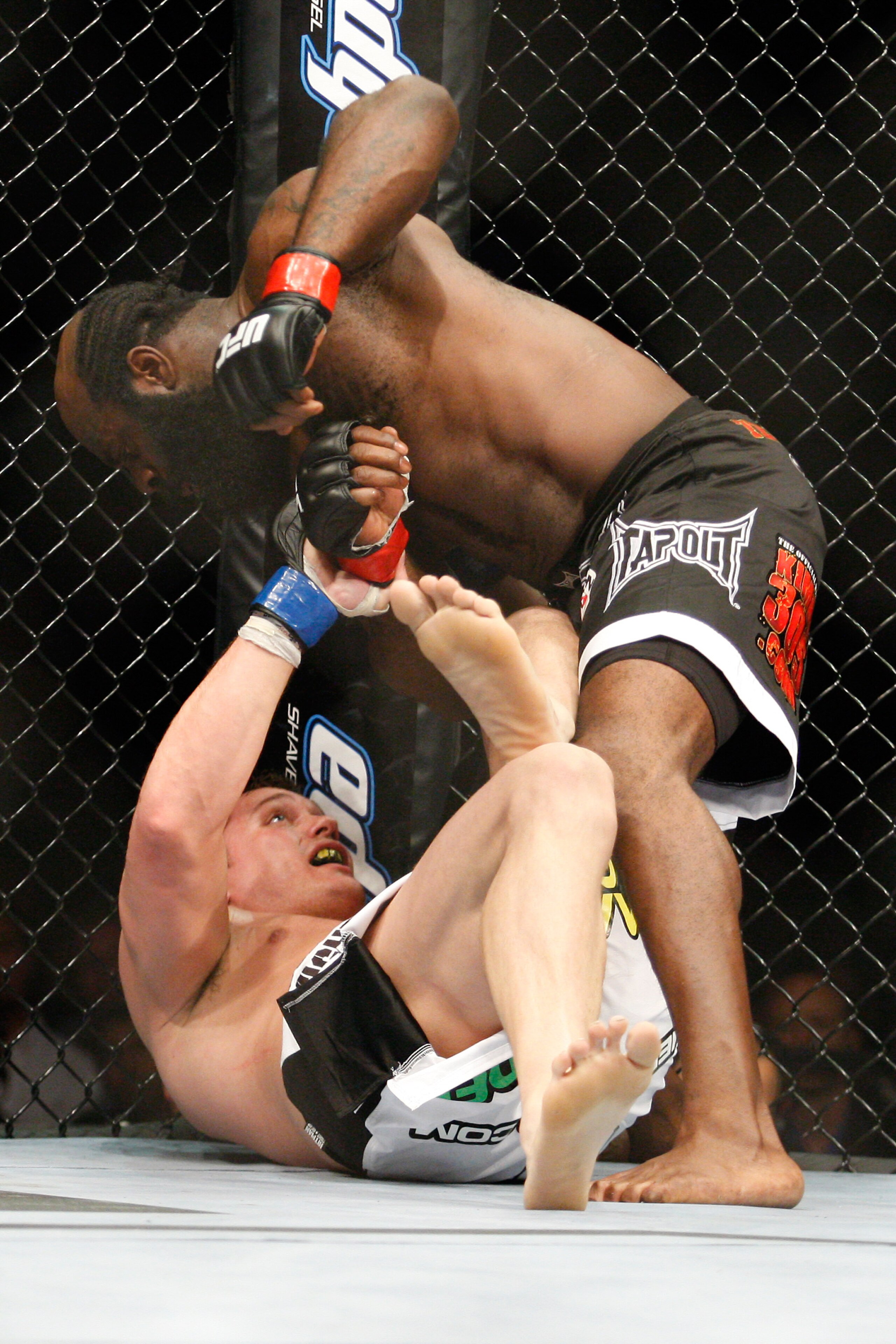 MONTREAL- MAY 8: Kimbo Slice (top) punches Matt Mitrione in their heavyweight bout at UFC 113 at Bell Centre on May 8, 2010 in Montreal, Quebec, Canada.  (Photo by Richard Wolowicz/Getty Images)