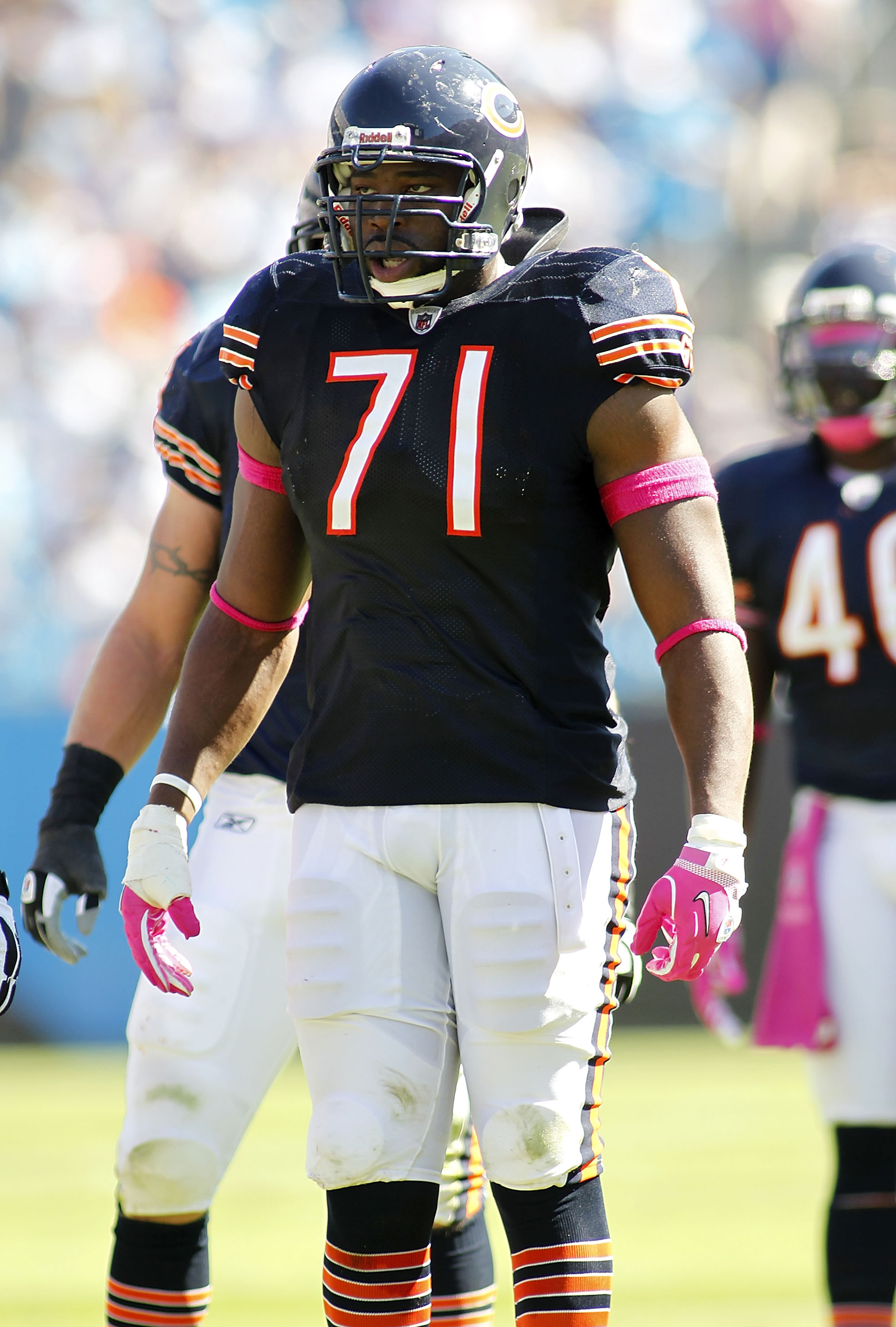 CHARLOTTE, NC - OCTOBER 10: Defensive tackle Israel Idonije #71 of the Chicago Bears stands on the field against the Carolina Panthers at Bank of America Stadium on October 10, 2010 in Charlotte, North Carolina. (Photo by Geoff Burke/Getty Images)