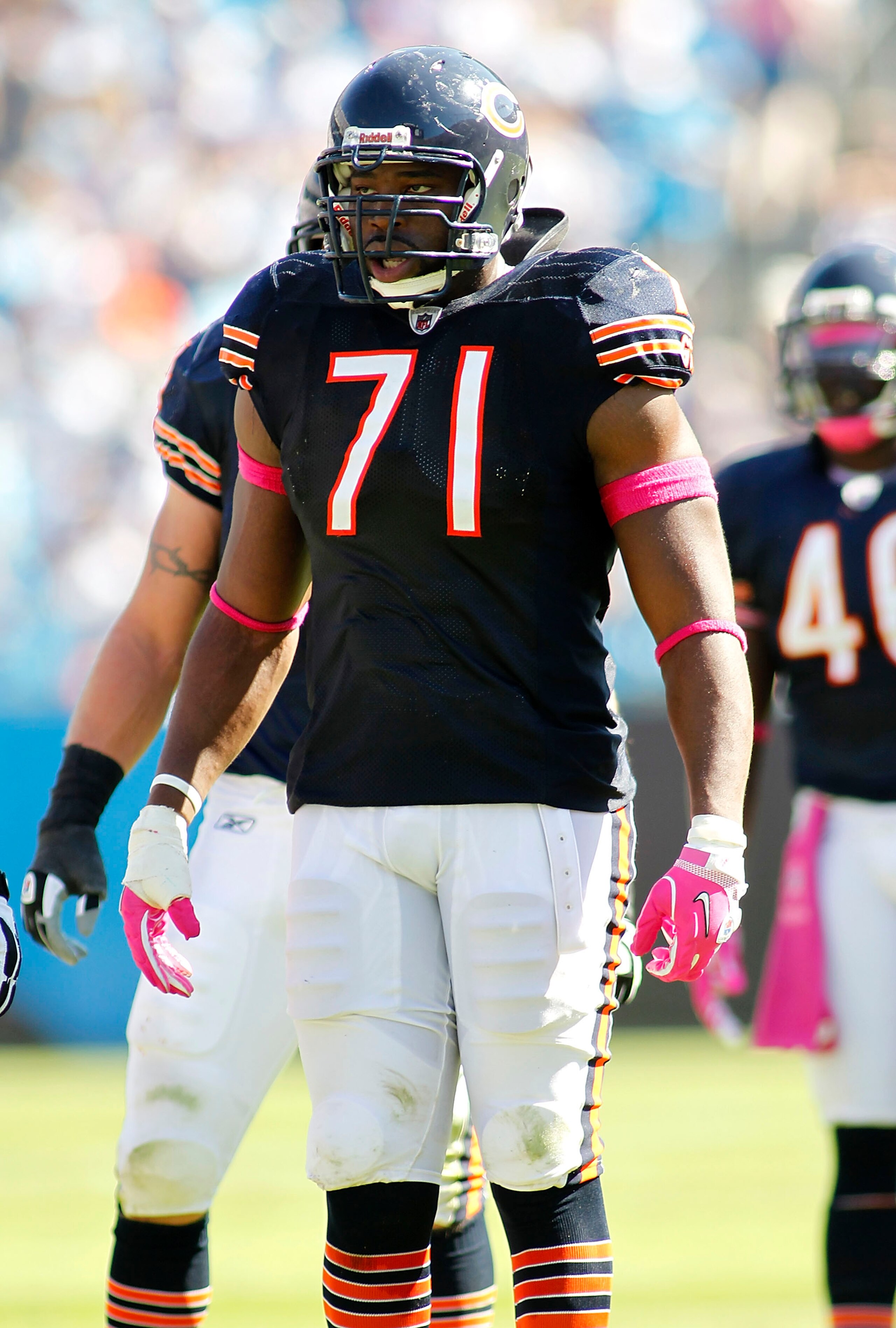 CHARLOTTE, NC - OCTOBER 10: Defensive tackle Israel Idonije #71 of the Chicago Bears stands on the field against the Carolina Panthers at Bank of America Stadium on October 10, 2010 in Charlotte, North Carolina. (Photo by Geoff Burke/Getty Images)